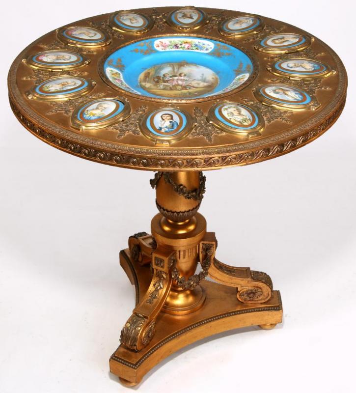 A CIRCA 1900 CENTER TABLE WITH SEVRES STYLE PLAQUES