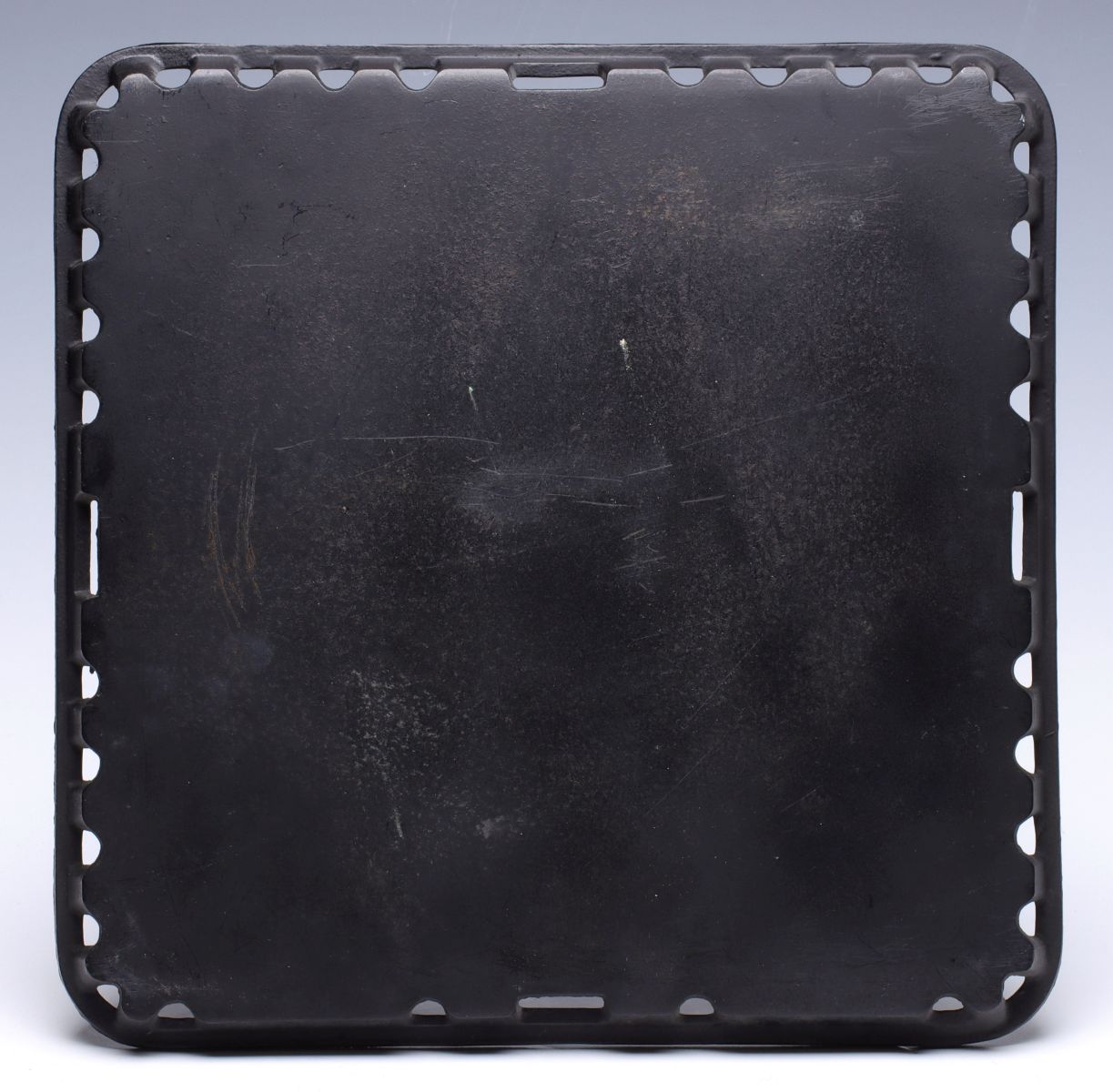 A RARE GRISWOLD SQUARE CLASSIC SAD IRON HEATING STAND