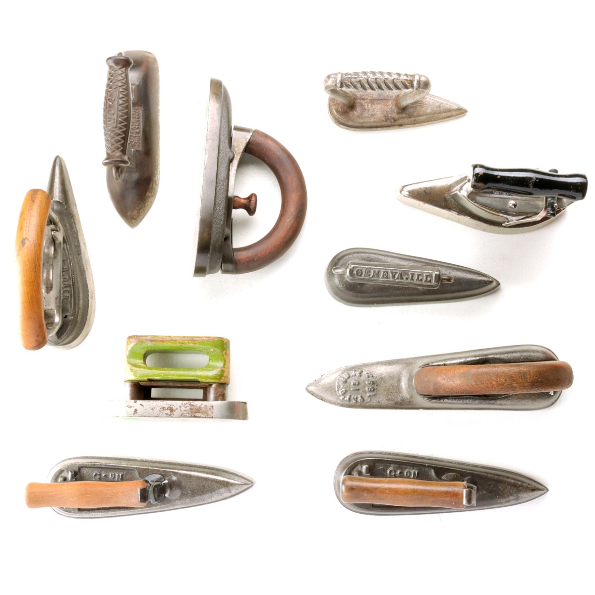 TEN ANTIQUE SLEEVE IRONS, CIRCA 1900