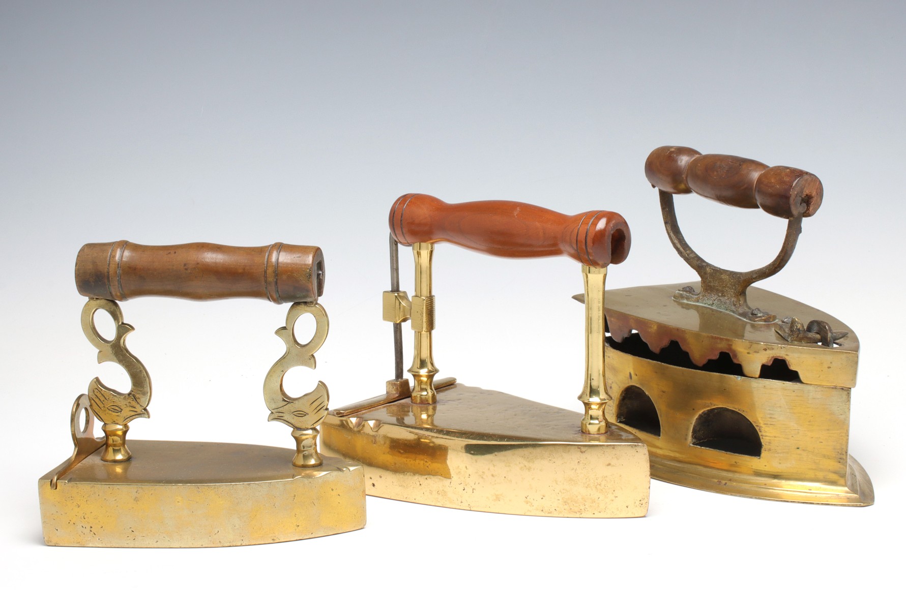 THREE 19TH CENTURY BRASS CHARCOAL AND BOX IRONS