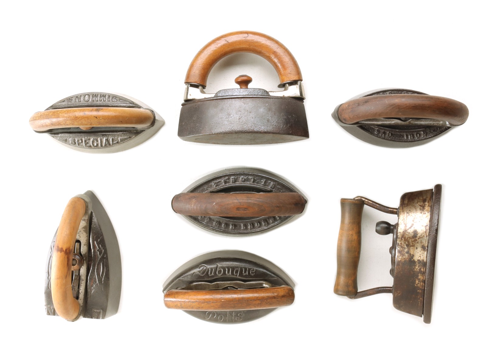 SEVEN ANTIQUE SAD IRONS WITH REMOVABLE HANDLES