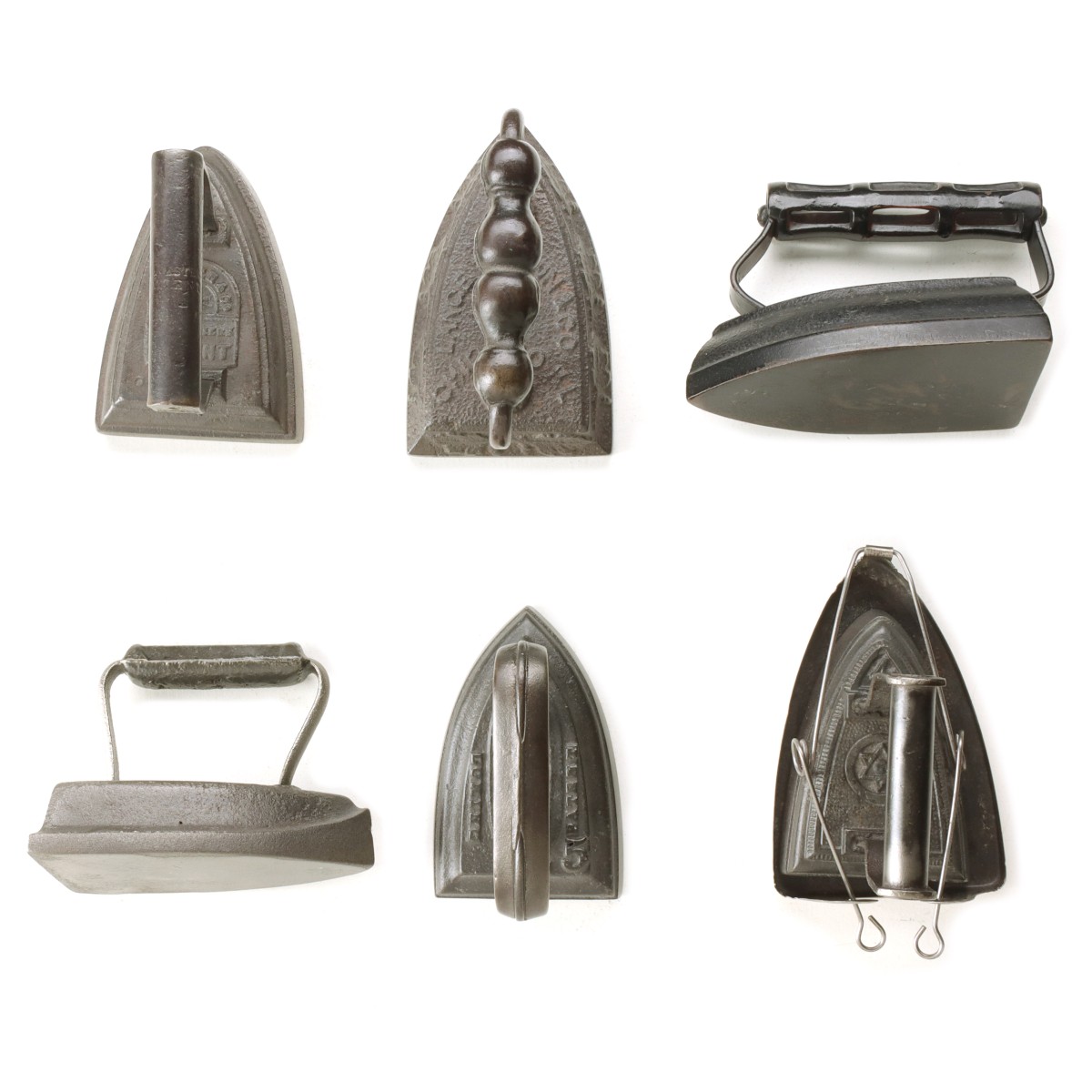 SIX ANTIQUE SAD IRONS