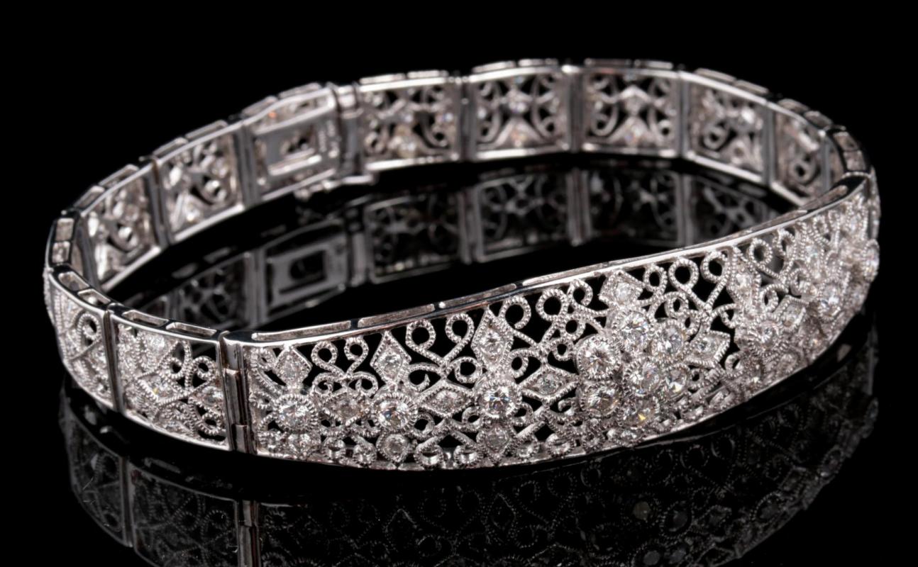 A 14K GOLD FILIGREE DIAMOND BRACELET EST. 2 CARATS TW