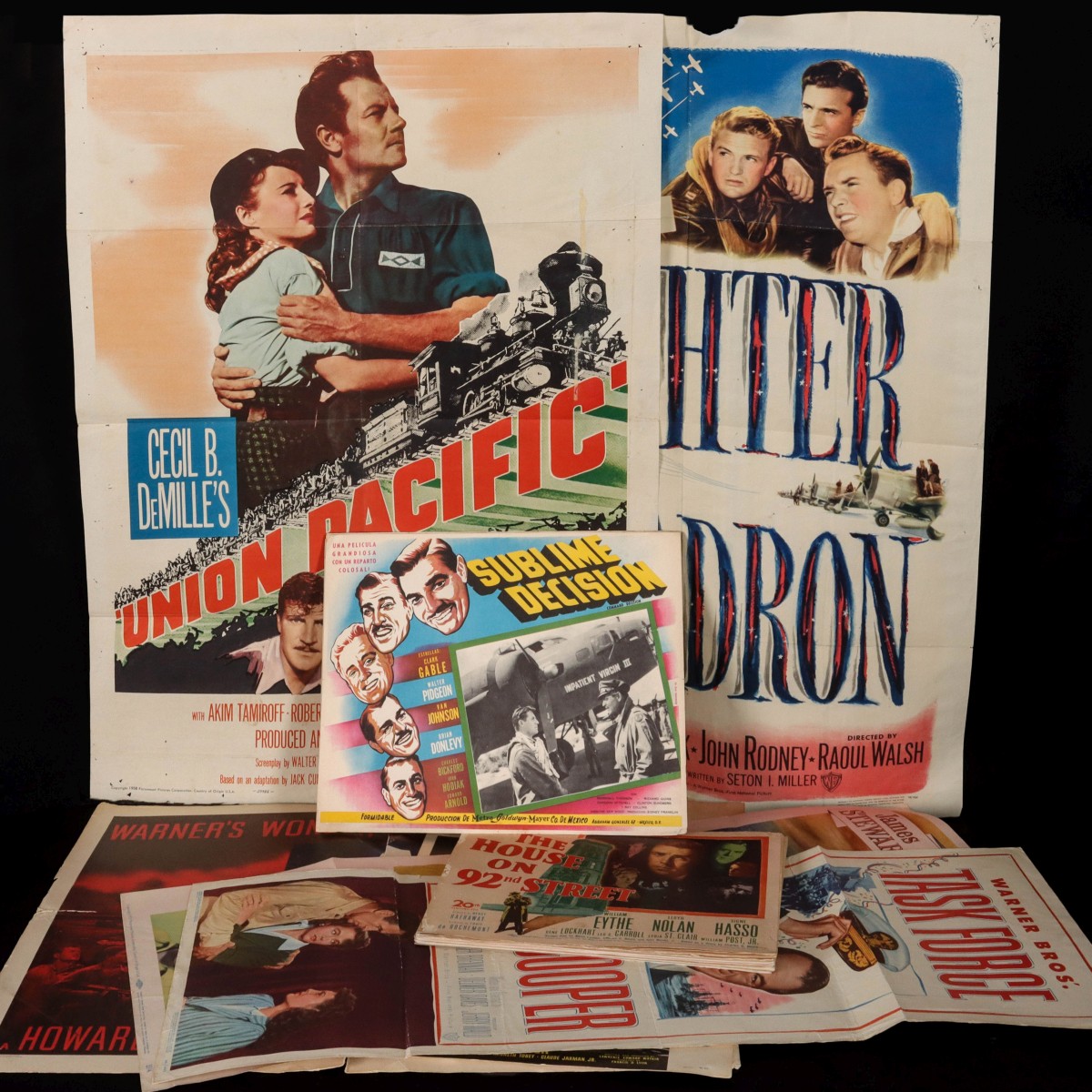 FIFTY WWII ERA MOVIE POSTERS AND LOBBY CARDS