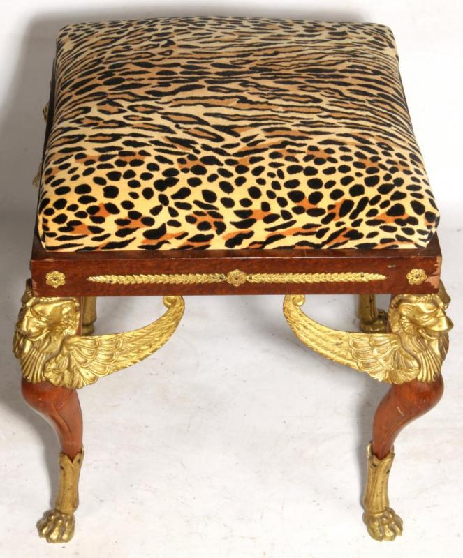 AN EMPIRE STYLE GILT BRONZE MOUNTED MAHOGANY STOOL