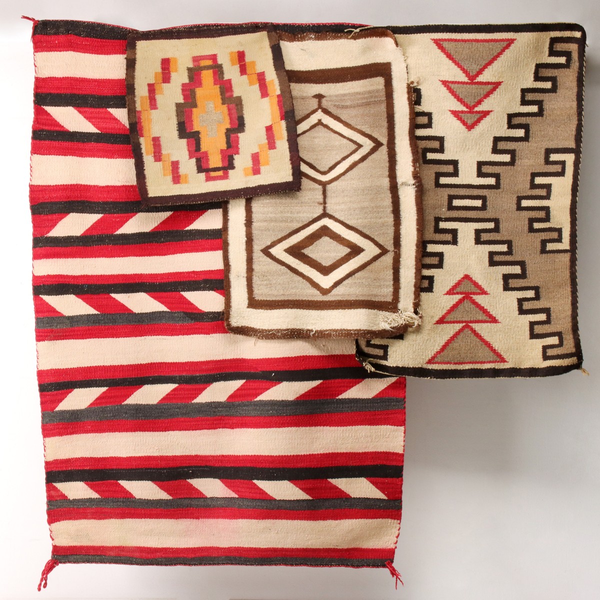 FOUR NAVAJO WEAVINGS CIRCA 2ND QUARTER 20TH CENTURY