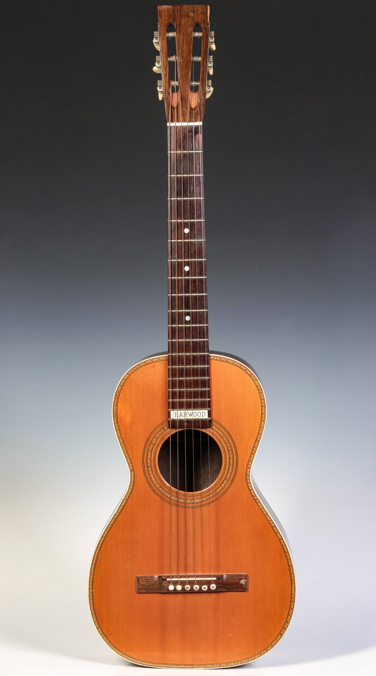 A HARWOOD 3/4 SIZE INLAID ROSEWOOD GUITAR