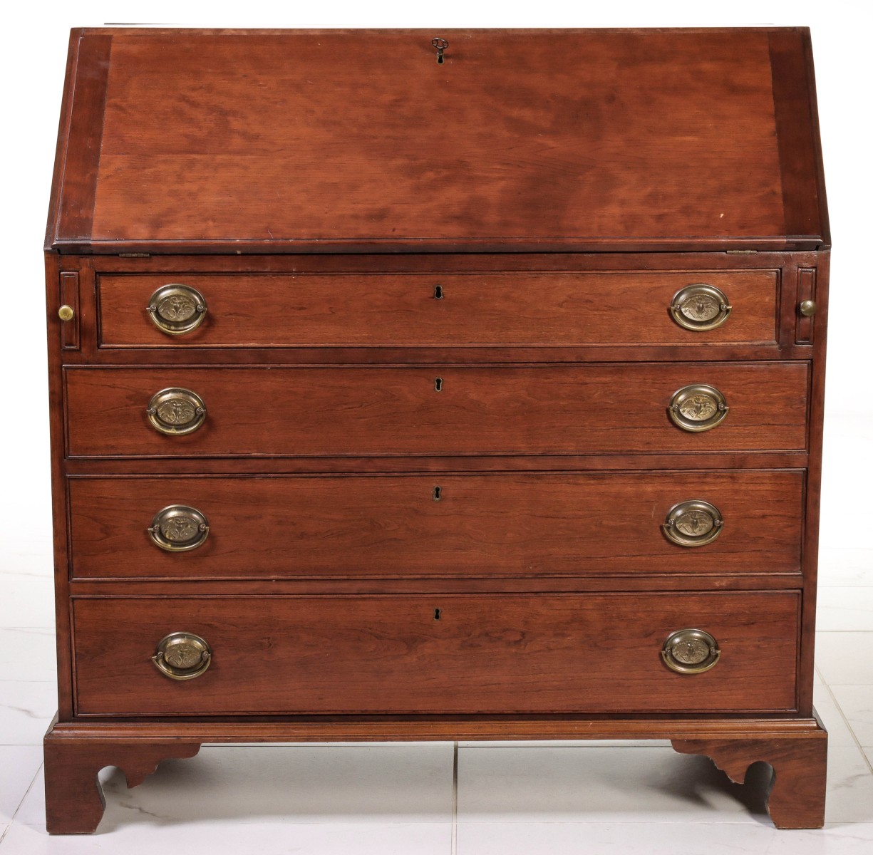 AN AMERICAN CHERRY CHIPPENDALE DESK CIRCA 1800