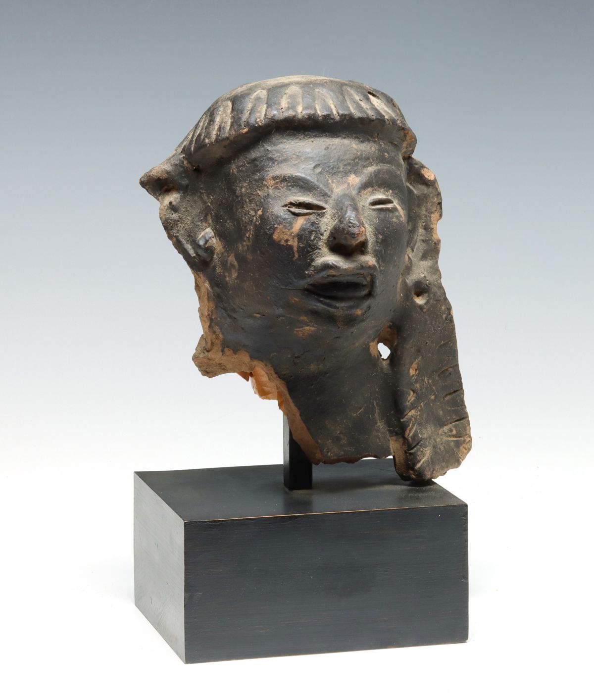 A PRE-COLUMBIAN VERACRUZ HEAD FRAGMENT