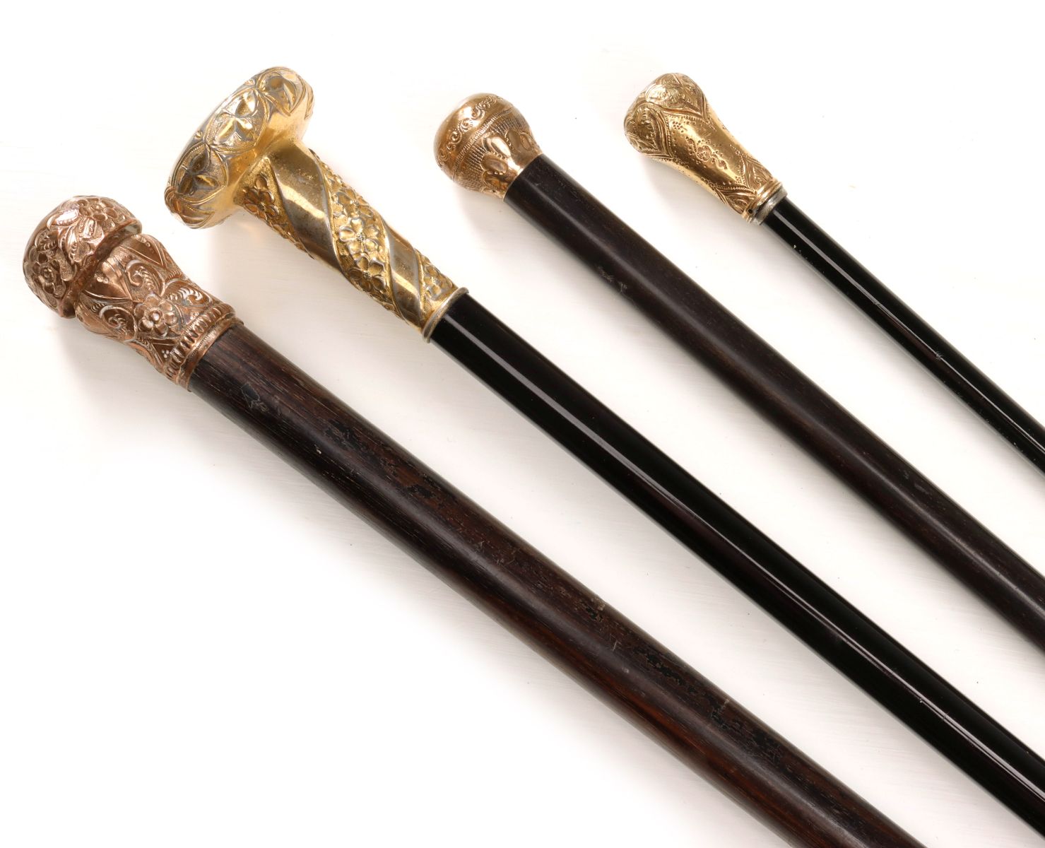 FOUR LATE 19TH C. GENTLEMAN'S WALKING STICKS