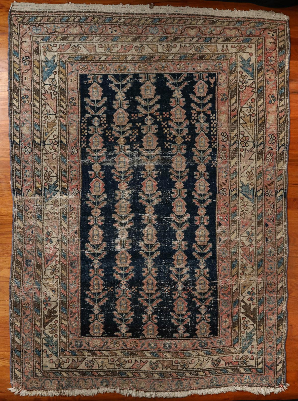 AN ANTIQUE PERSIAN HAMADAN SCATTER RUG