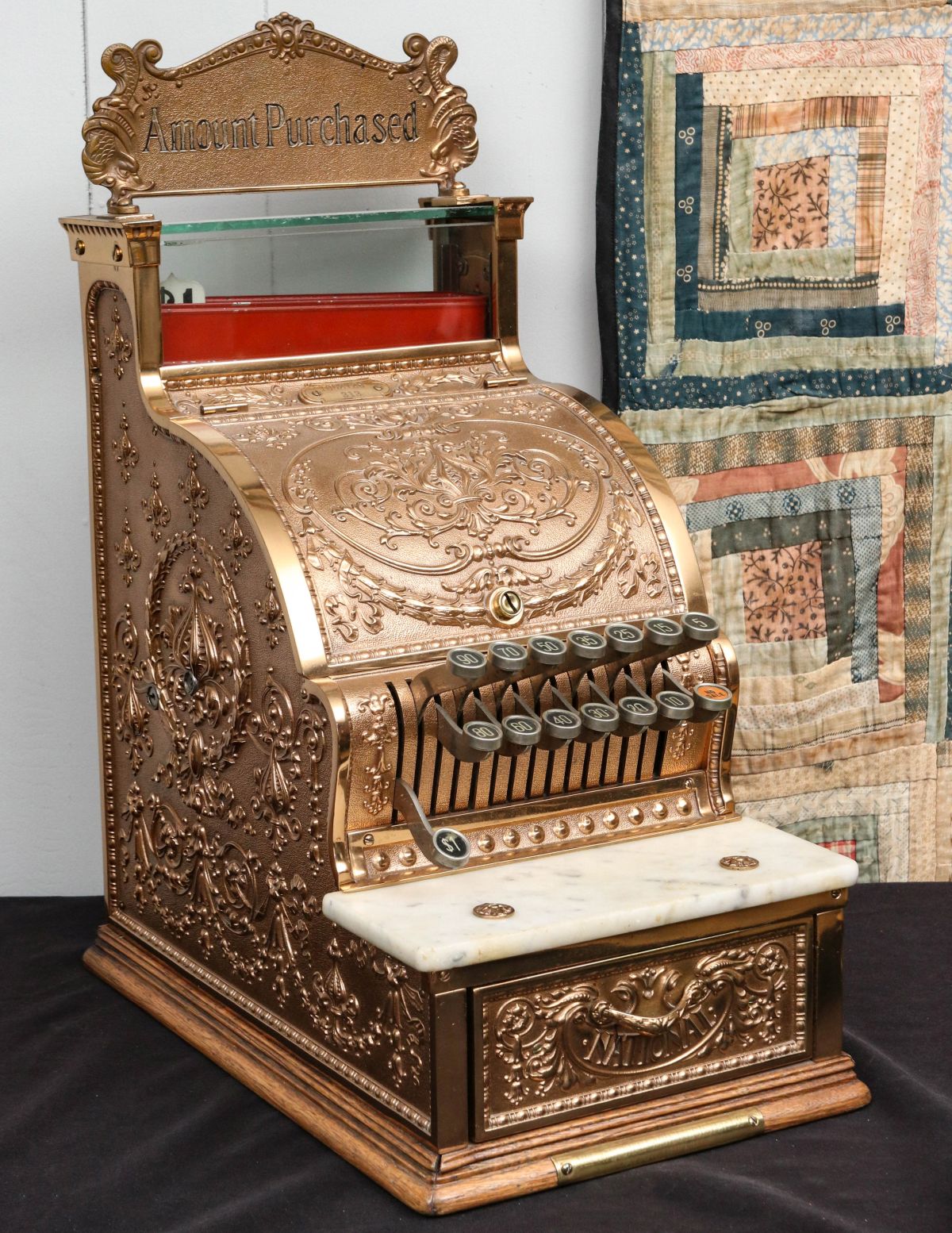 A NATIONAL CASH REGISTER MODEL 313 WITH TOP SIGN