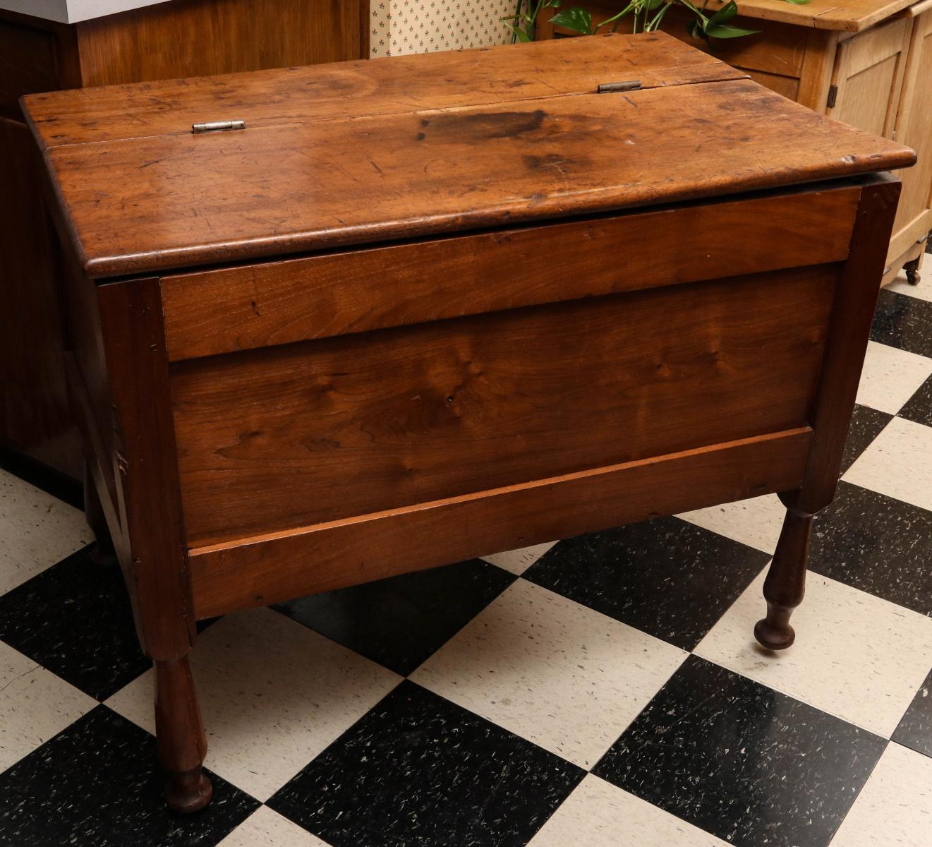 A 19TH C AMERICAN CHERRY FLOUR BIN ON LEGS