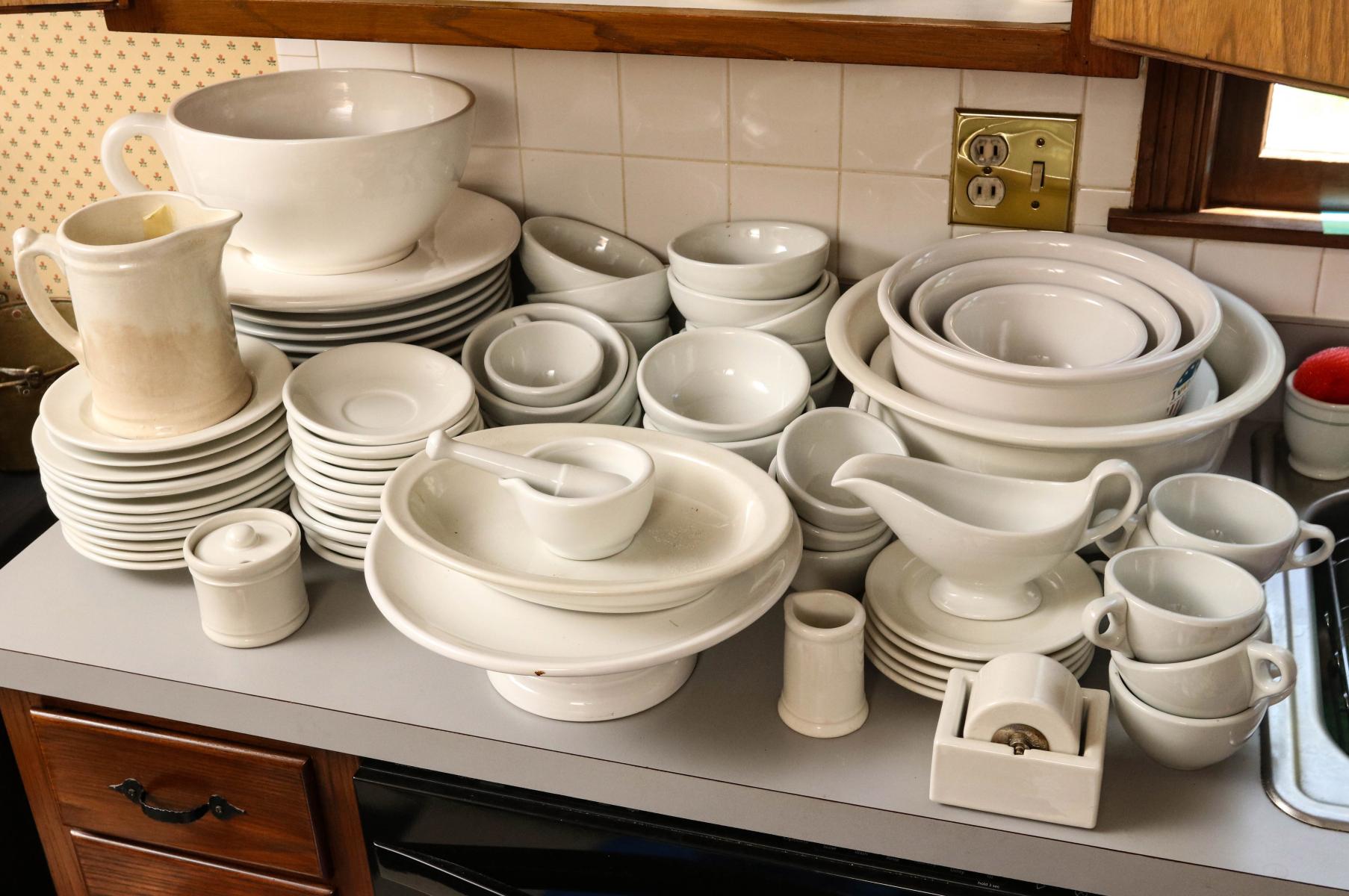 EIGHTY PIECES OF WHITE STONEWARE