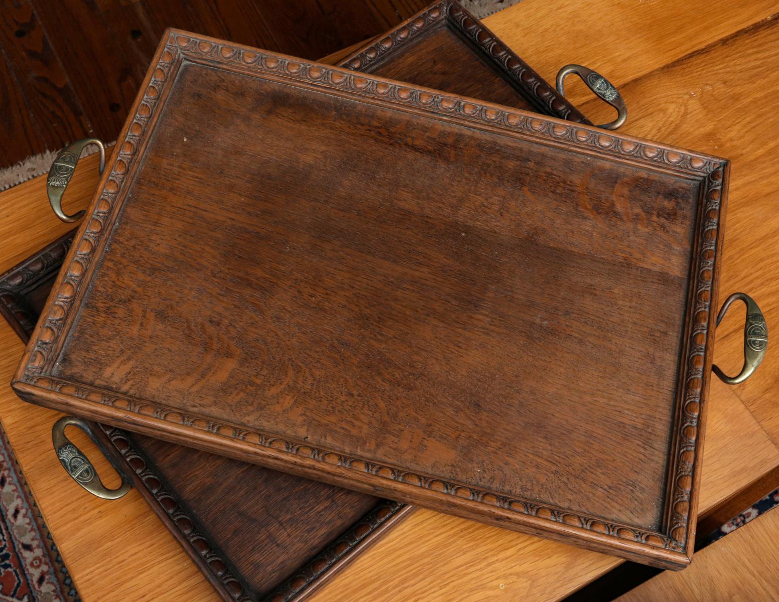 TWO ST. DUNSTAN OAK SERVING TRAYS C. 1920