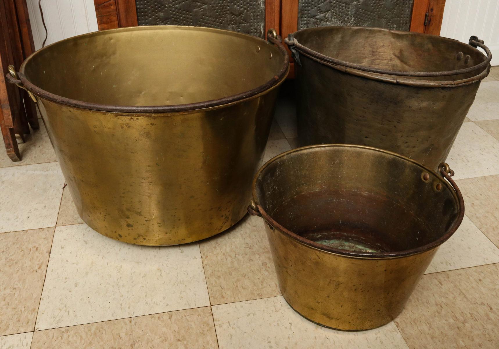 THREE 19TH CENTURY SPUN BRASS KETTLES