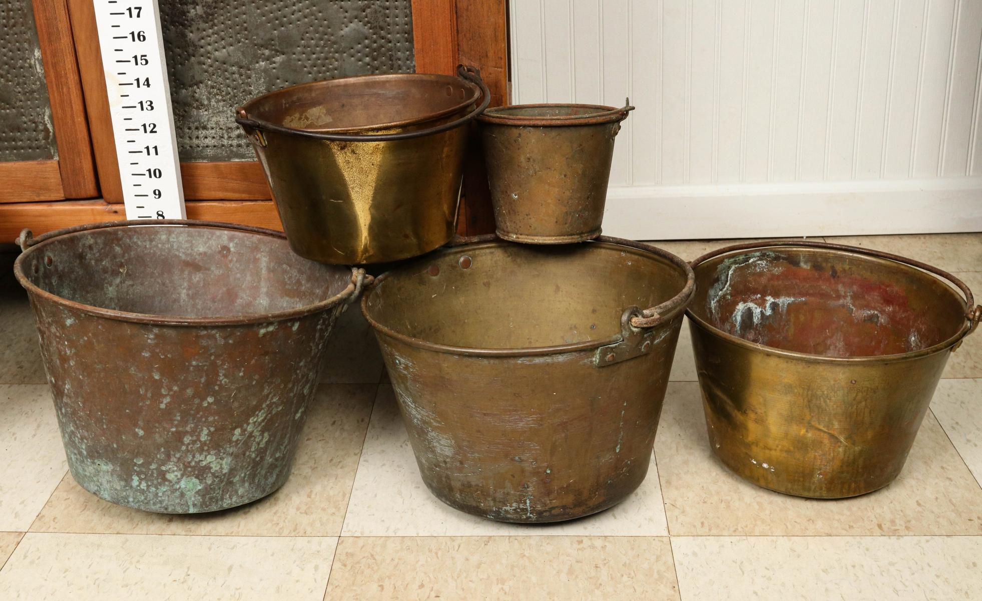 FIVE 19TH CENTURY SPUN BRASS KETTLES