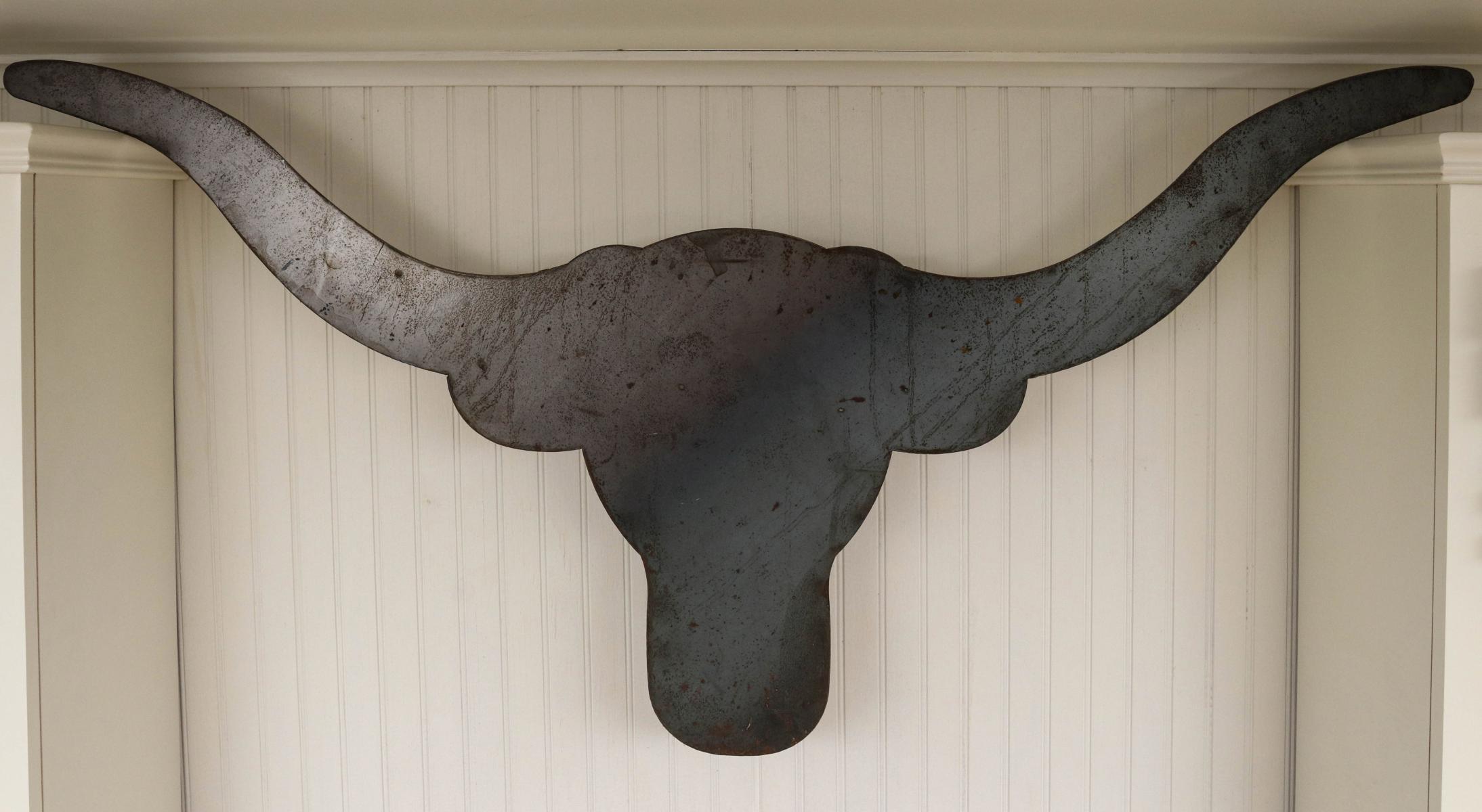 A SHEET IRON SILHOUETTE OF LONGHORN STEER