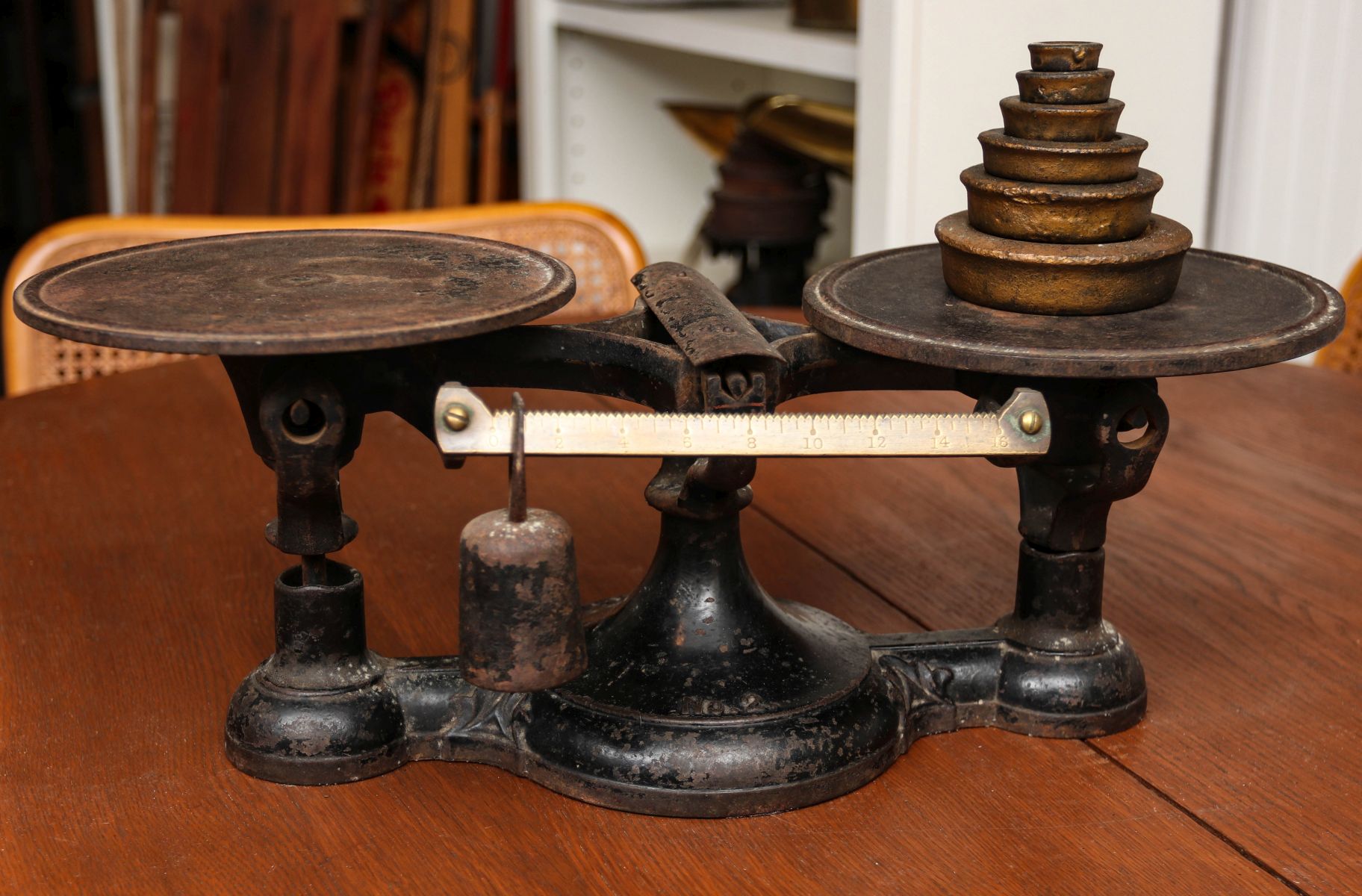 19TH CENTURY IRON BALANCE SCALES WITH BRASS BEAM