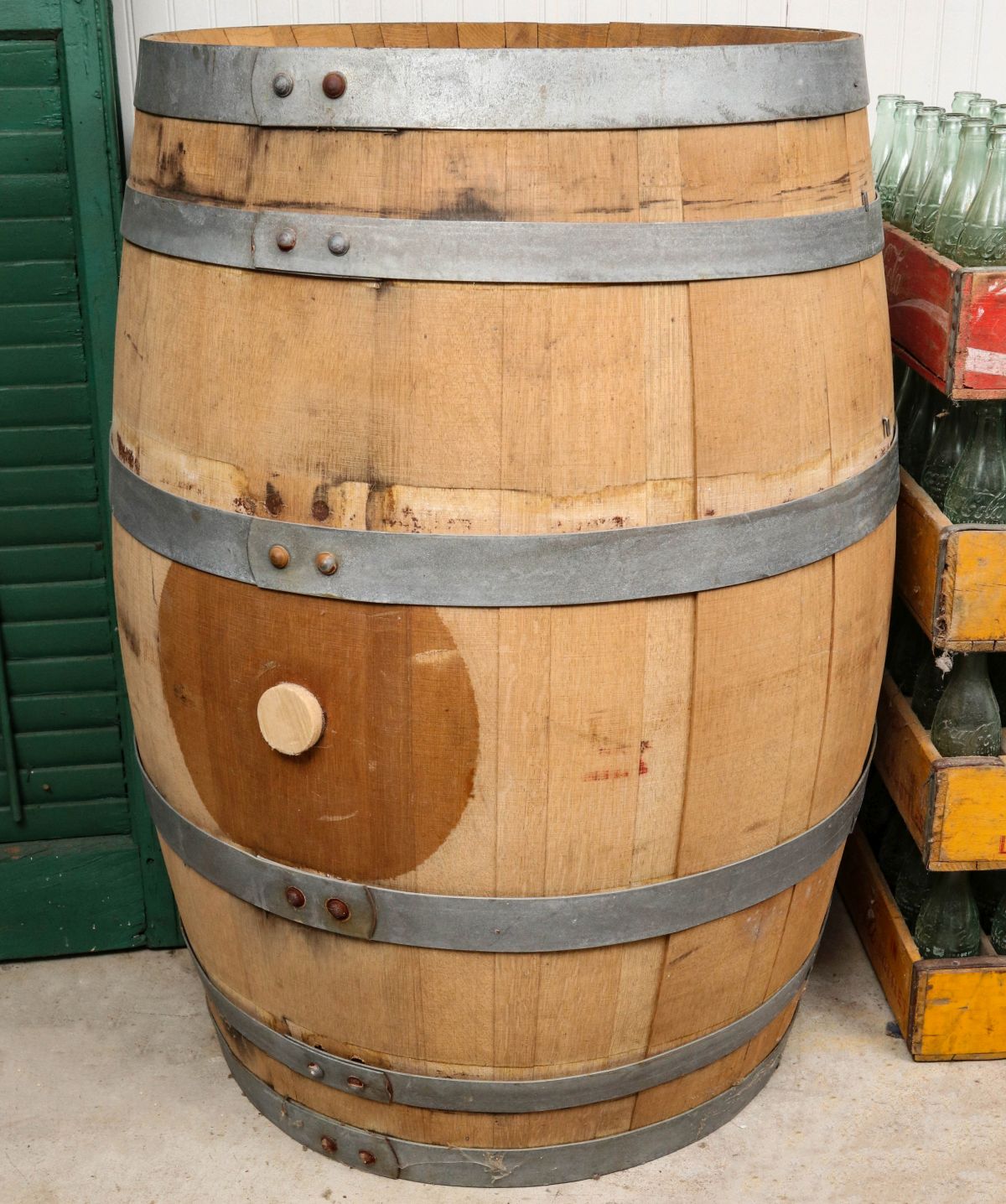 A HAND MADE OAK BARREL BRANDED A & K COOPERAGE