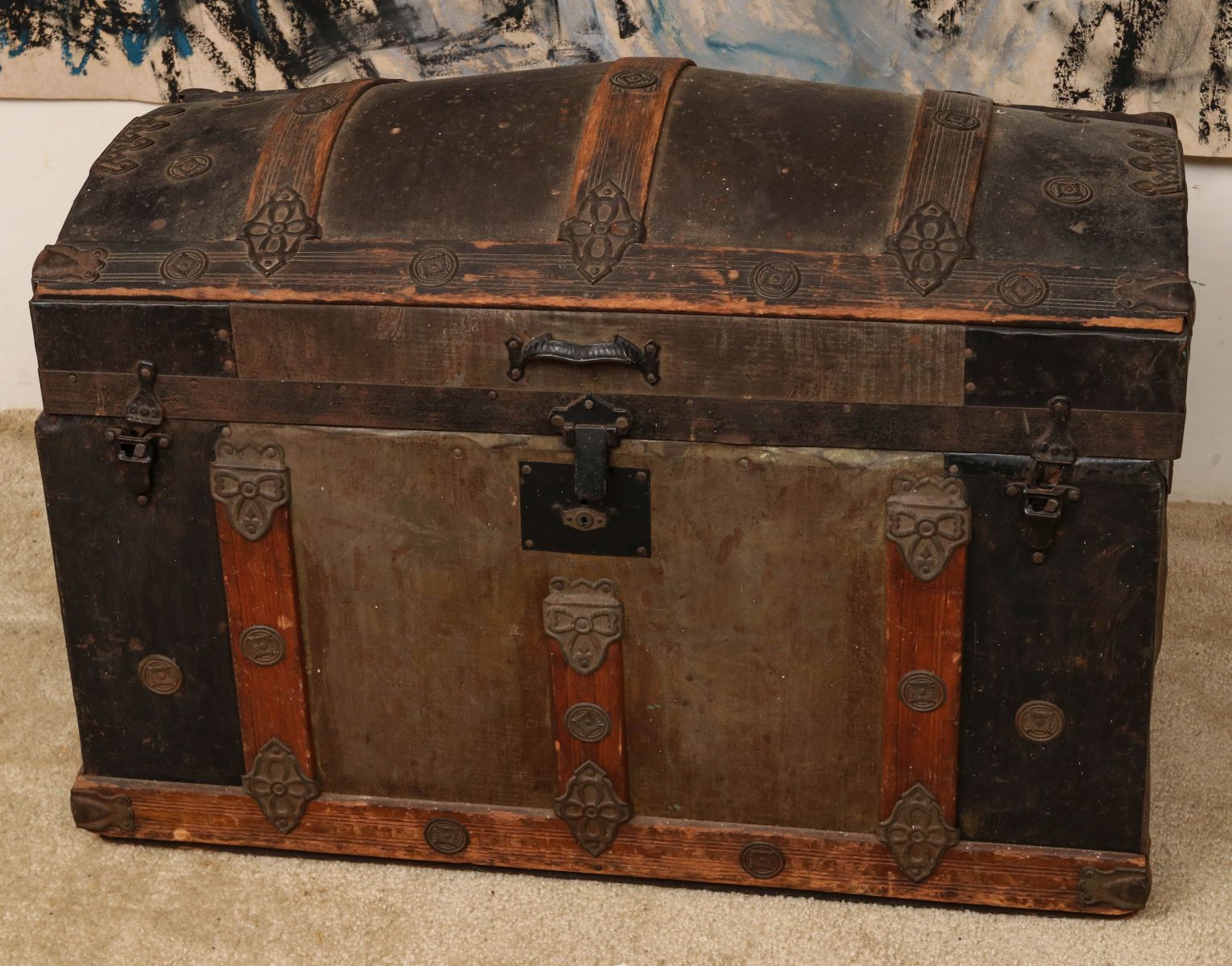 A VICTORIAN WOOD SLAT 'HUMP BACK' TRAVEL TRUNK