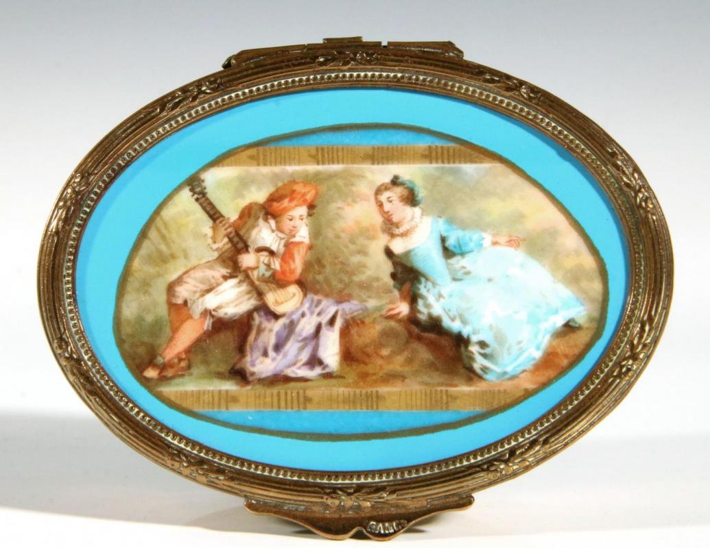 A CIRCA 1900 ORMOLU BOX WITH SEVRES TYPE PORCELAIN