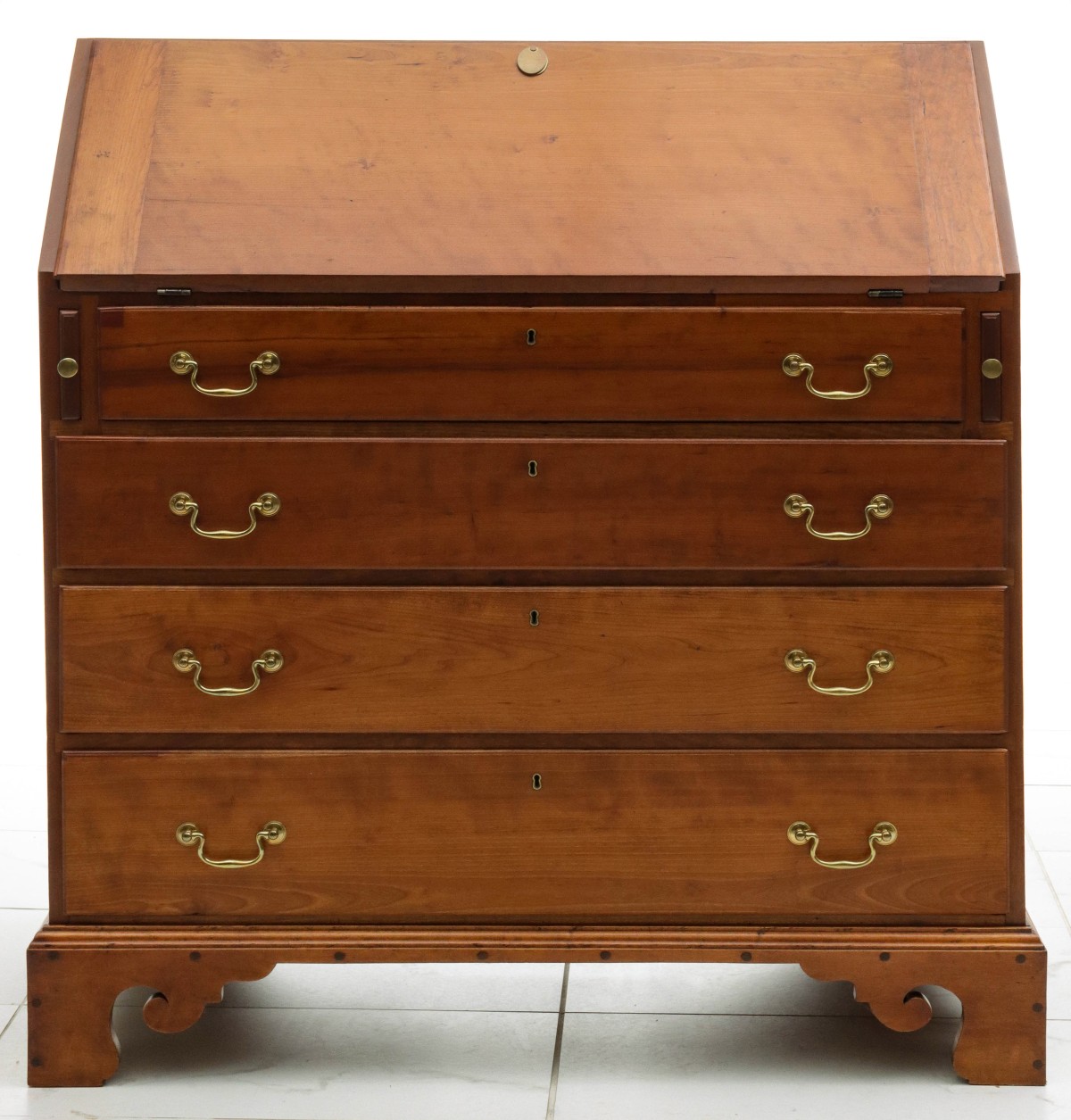 AN AMERICAN CHERRY CHIPPENDALE DESK CIRCA 1800