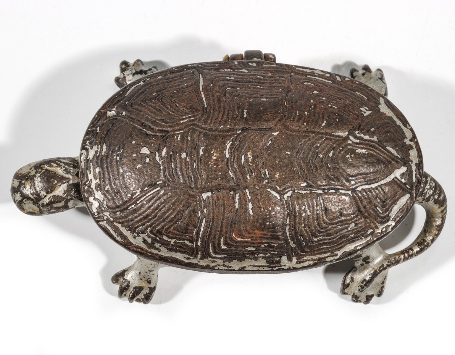 AN IRON TURTLE MATCH SAFE STRIKER CIRCA 1900