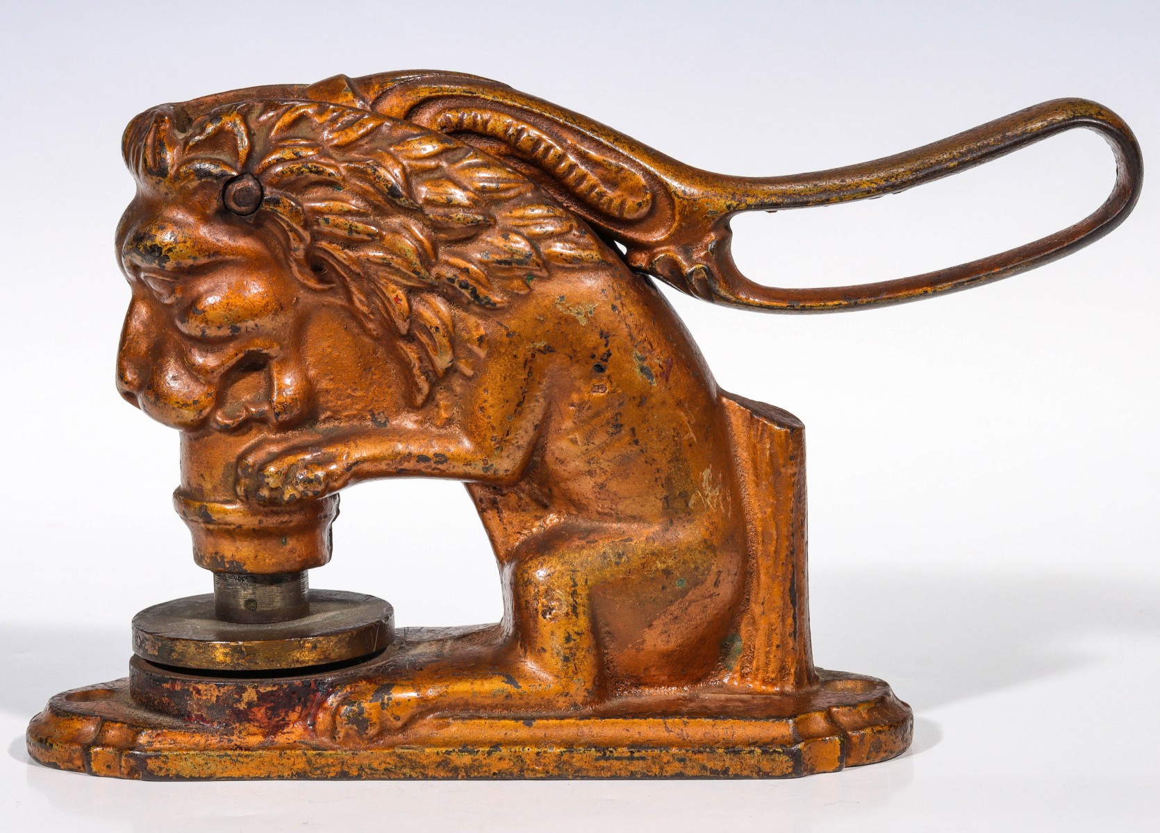 A LARGE FIGURAL SEATED LION IRON SEAL C. 1888