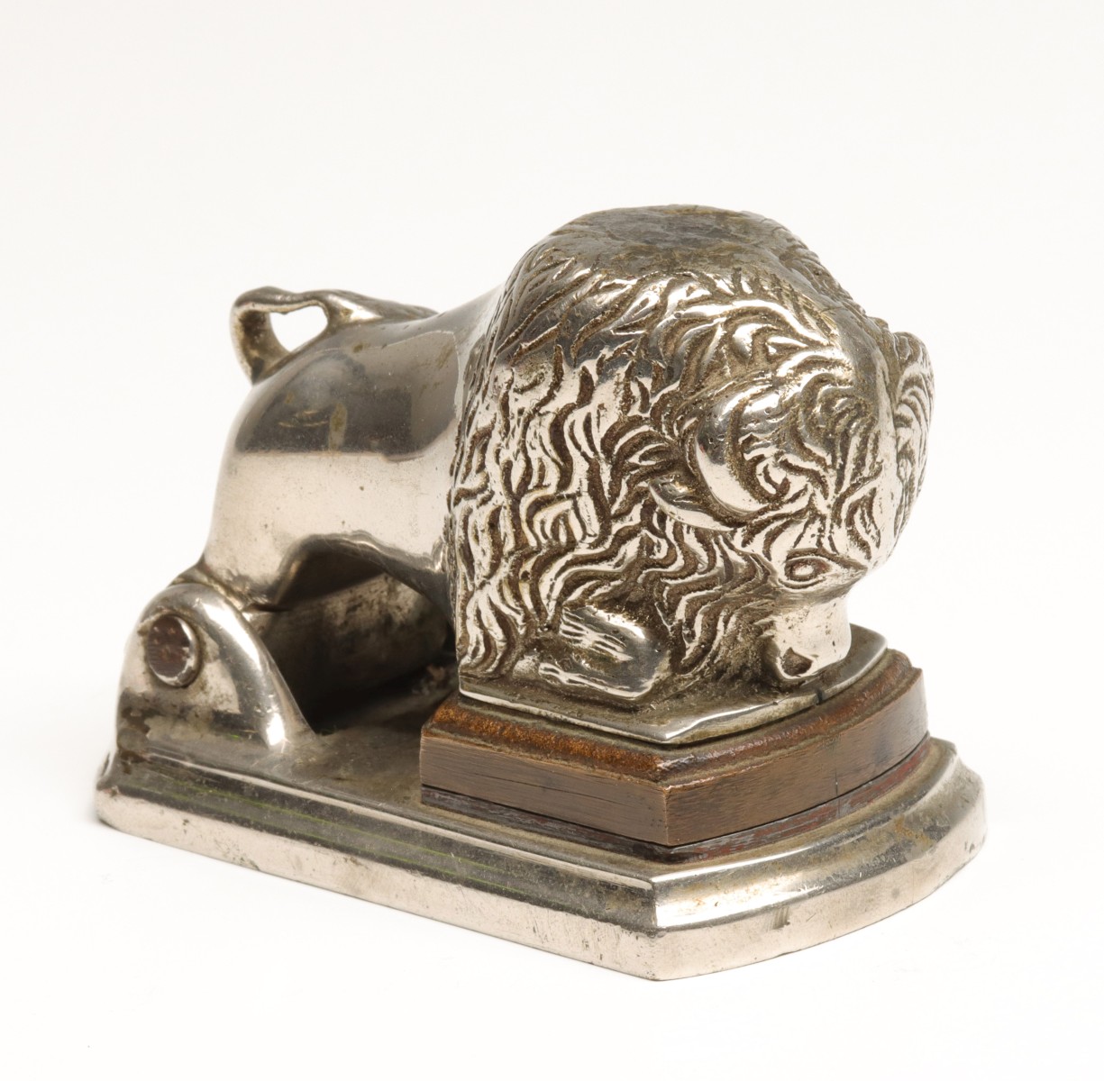 A FIGURAL BISON NICKEL PLATED IRON SEAL CIRCA 1890