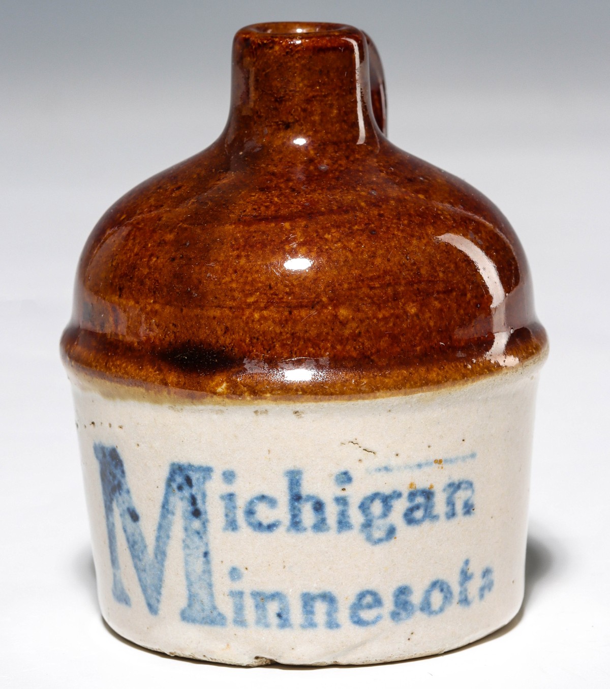 RED WING ''MICHIGAN MINNESOTA'' STONEWARE MINI JUG