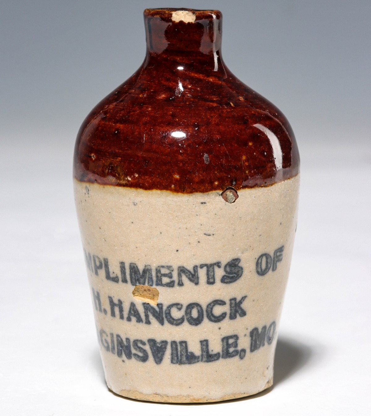 HIGGINSVILLE MISSOURI STONEWARE MINI JUG