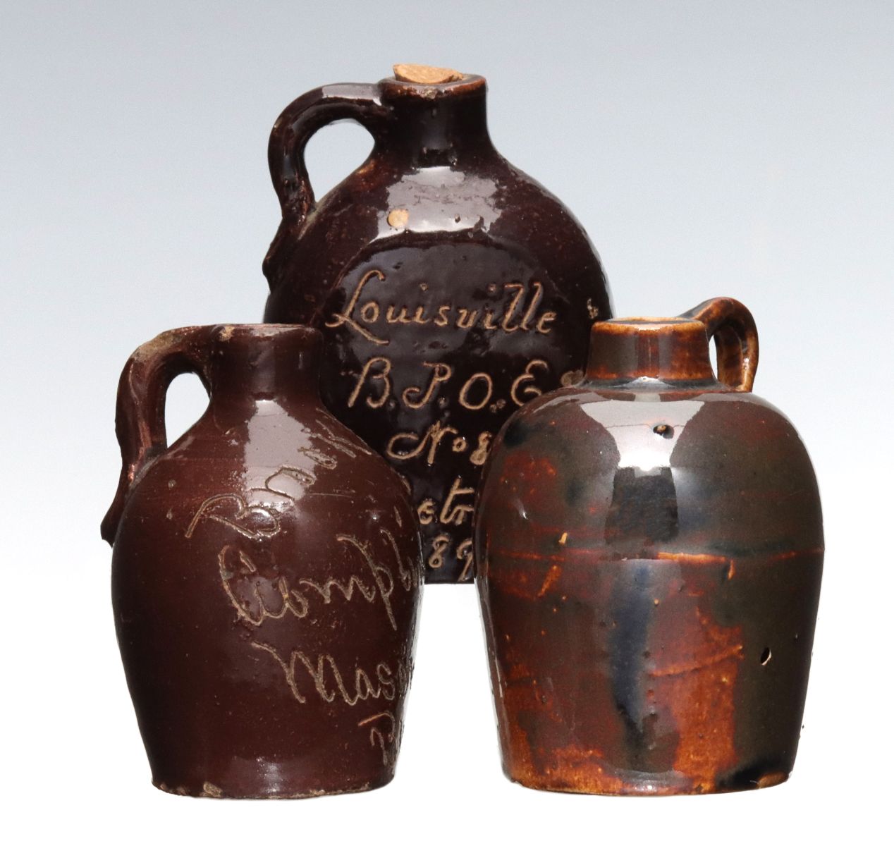 THREE FRATERNAL ORGANIZATION STONEWARE MINI JUGS