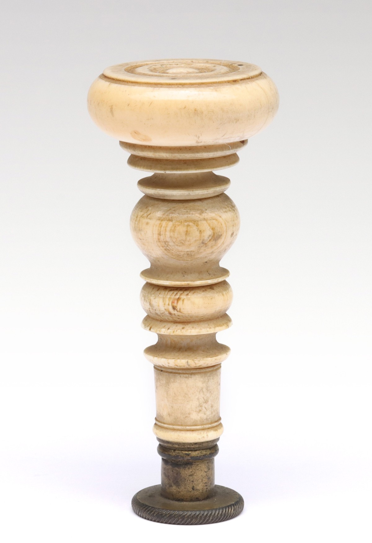 A 19TH CENTURY TURNED BONE WAX SEAL