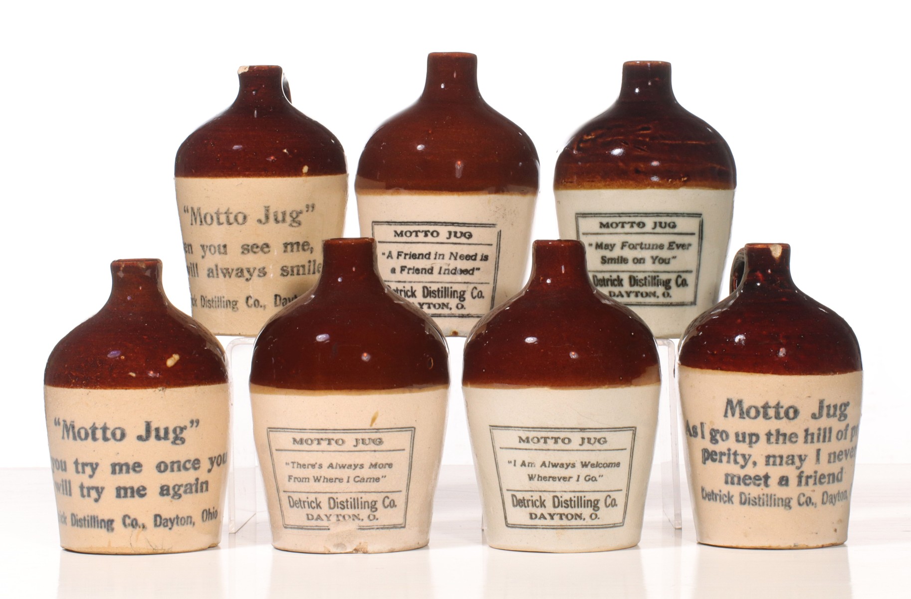 SEVEN DERRICK DISTILLING STONEWARE MOTTO JUGS