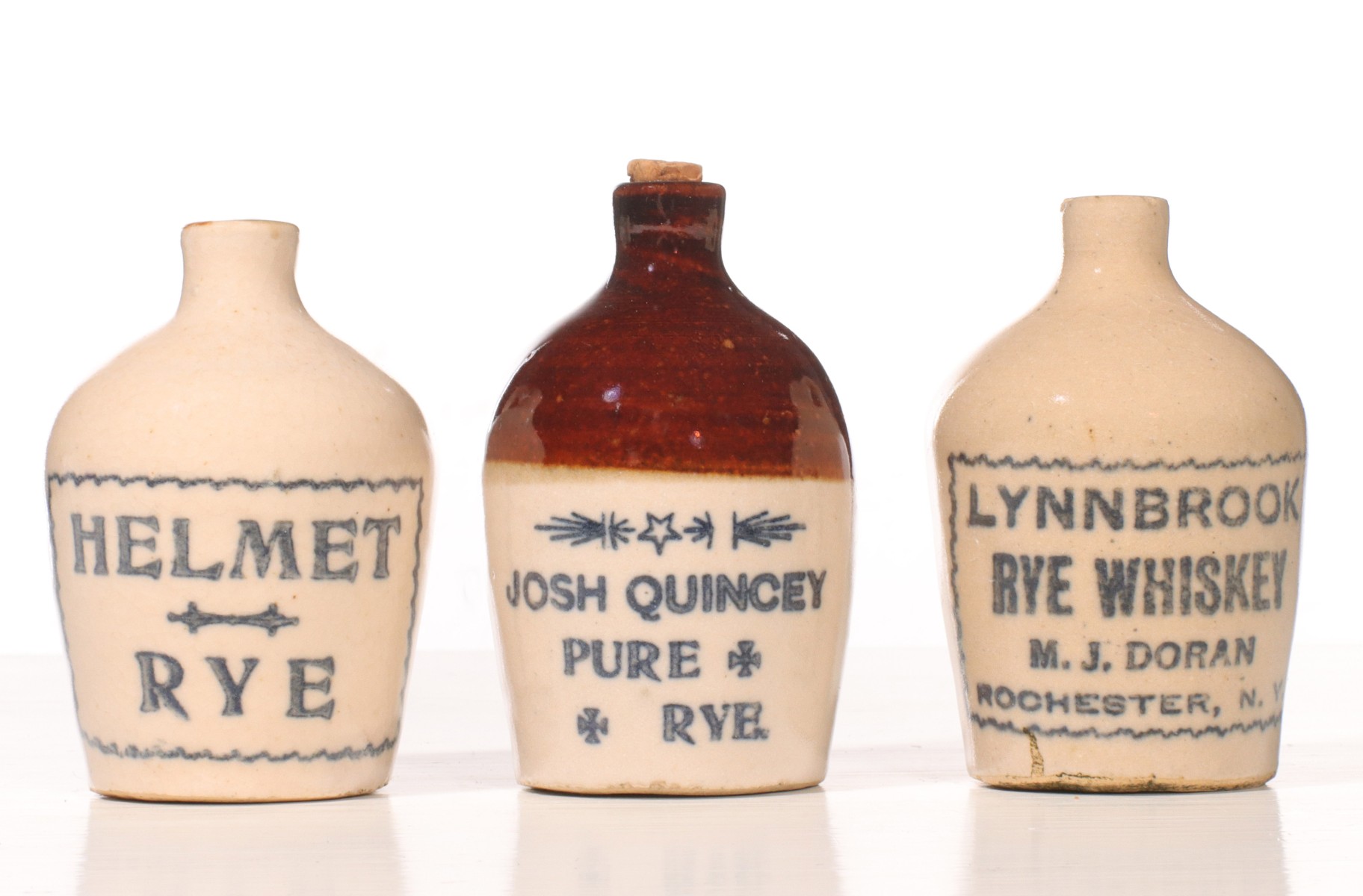 THREE RYE WHISKEY STONEWARE MINI JUGS