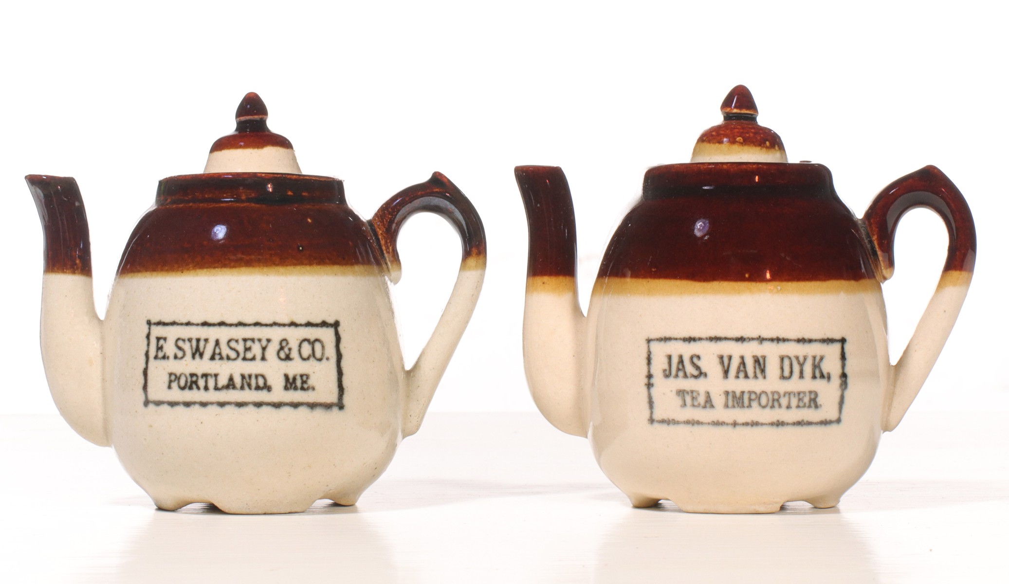 TWO ANTIQUE TEA COMPANY ADVERTISING STONEWARE TEAPOTS