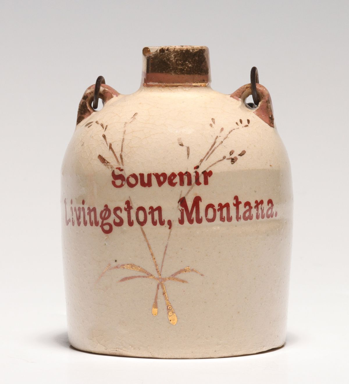 A LIVINGSTON MONTANA BAIL HANDLE STONEWARE MINI JUG