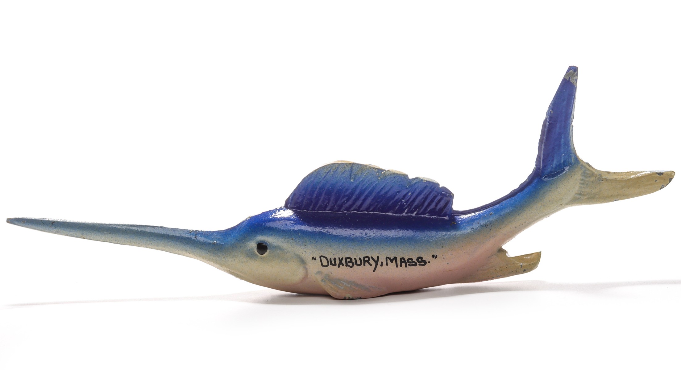 A VINTAGE BLUE MARLIN FIGURAL IRON BOTTLE OPENER