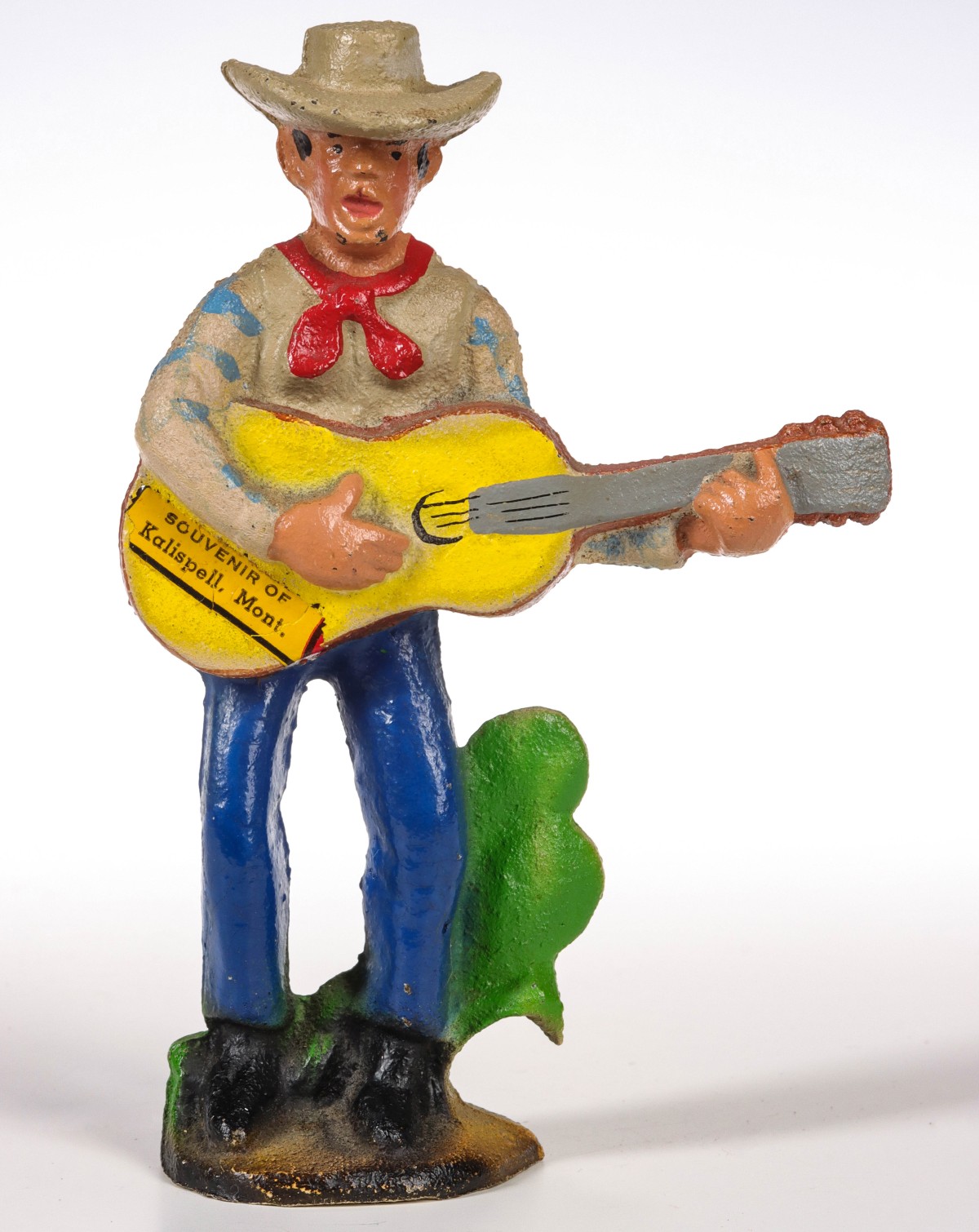 A NICE CLEAN FIGURAL COWBOY VINTAGE IRON BOTTLE OPENER