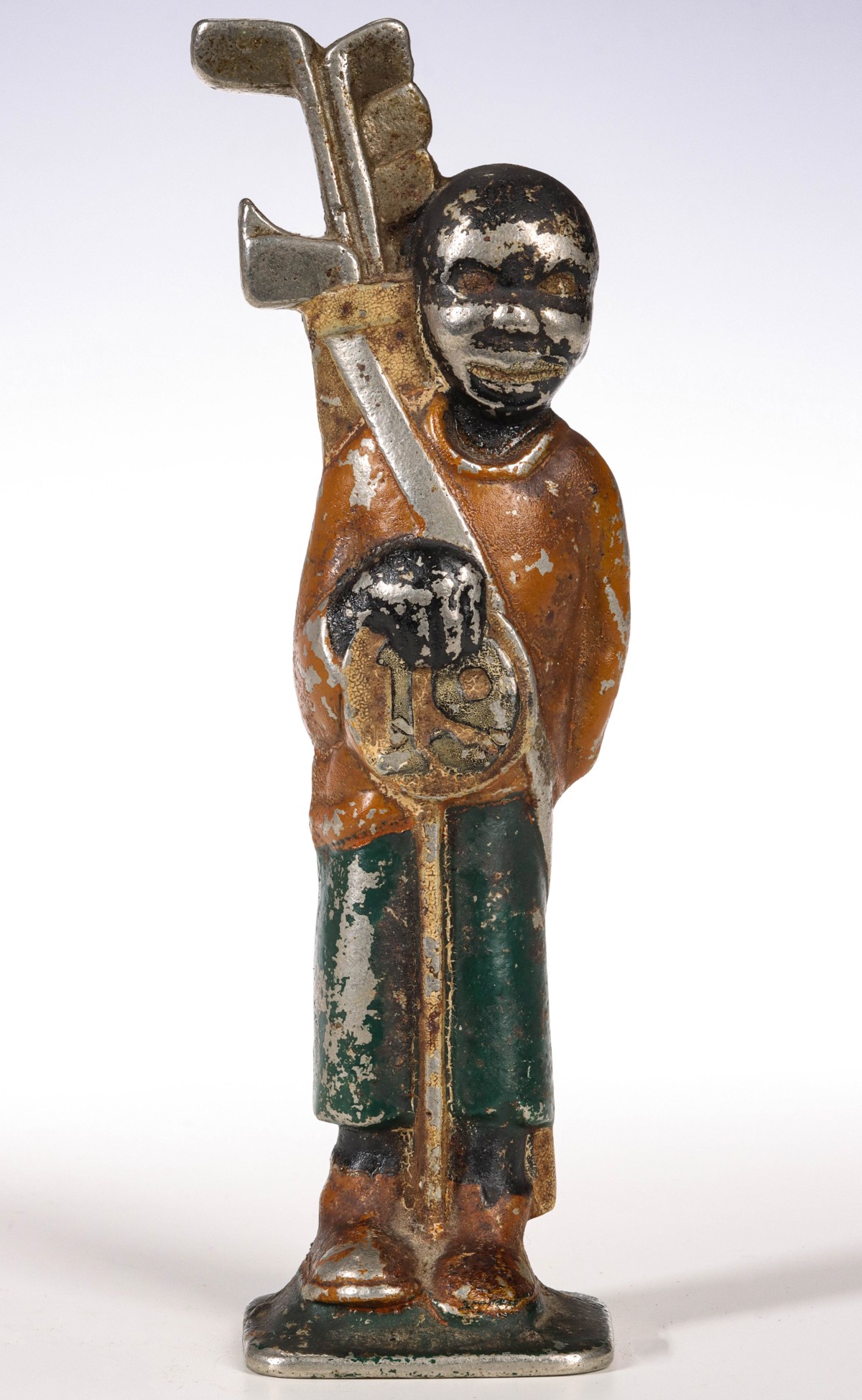 A RARE 1932 FIGURAL BLACK GOLF CADDY IRON BOTTLE OPENER