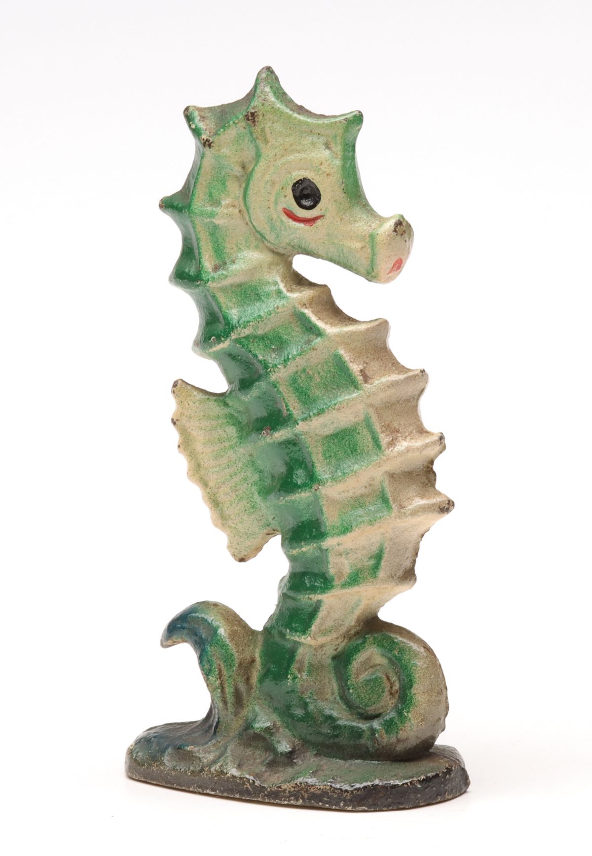 A VINTAGE FIGURAL SEAHORSE IRON BOTTLE OPENER