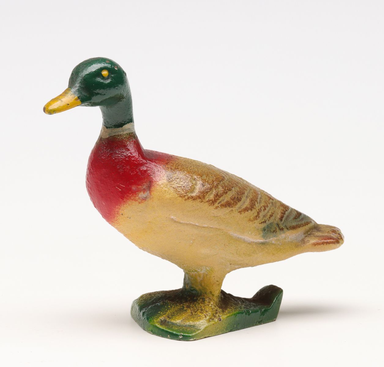 A VINTAGE FIGURAL MALLARD DUCK IRON BOTTLE OPENER