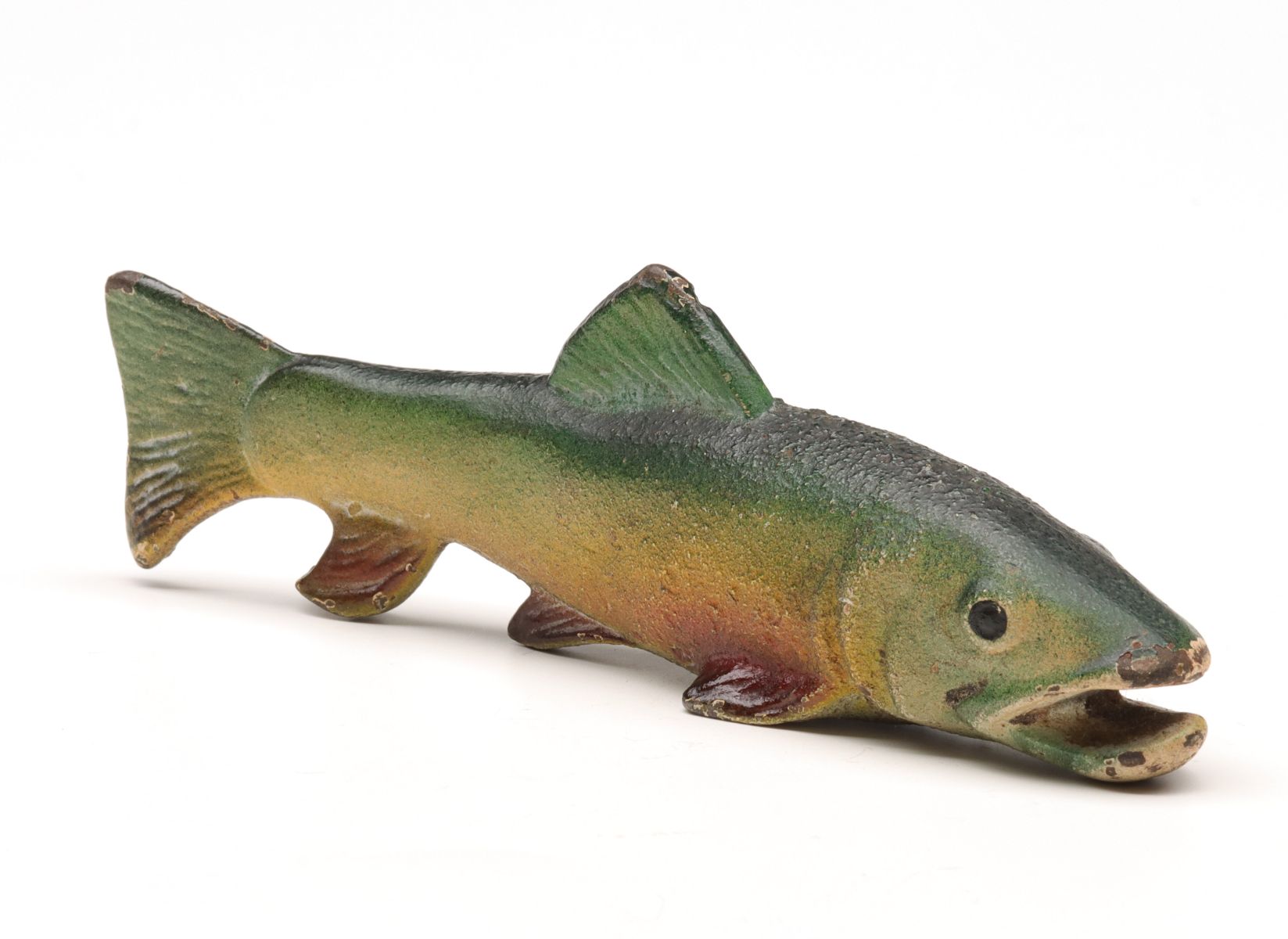 A VINTAGE TROUT FIGURAL FISH IRON BOTTLE OPENER