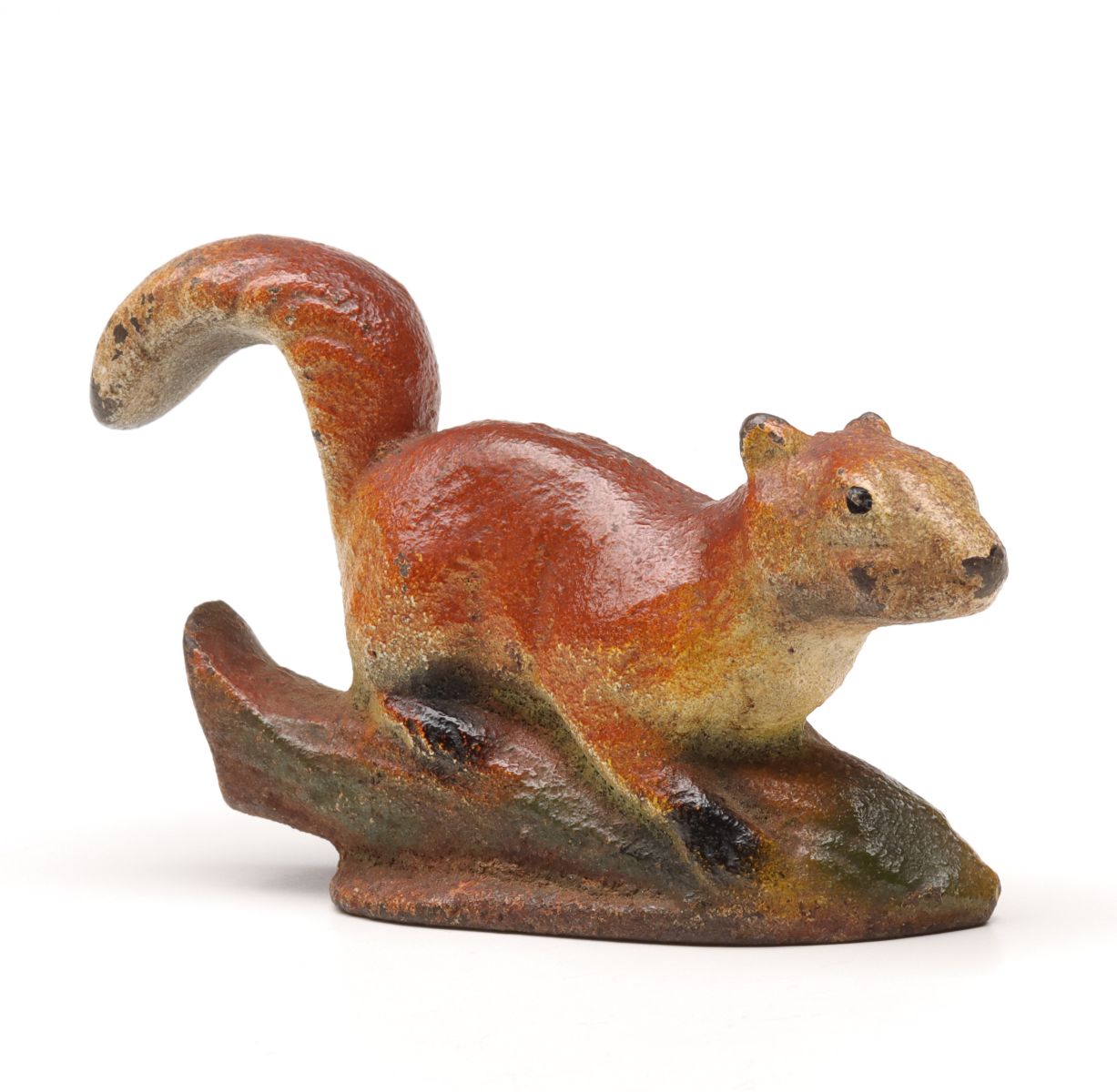 A VINTAGE FIGURAL SQUIRREL CAST IRON BOTTLE OPENER