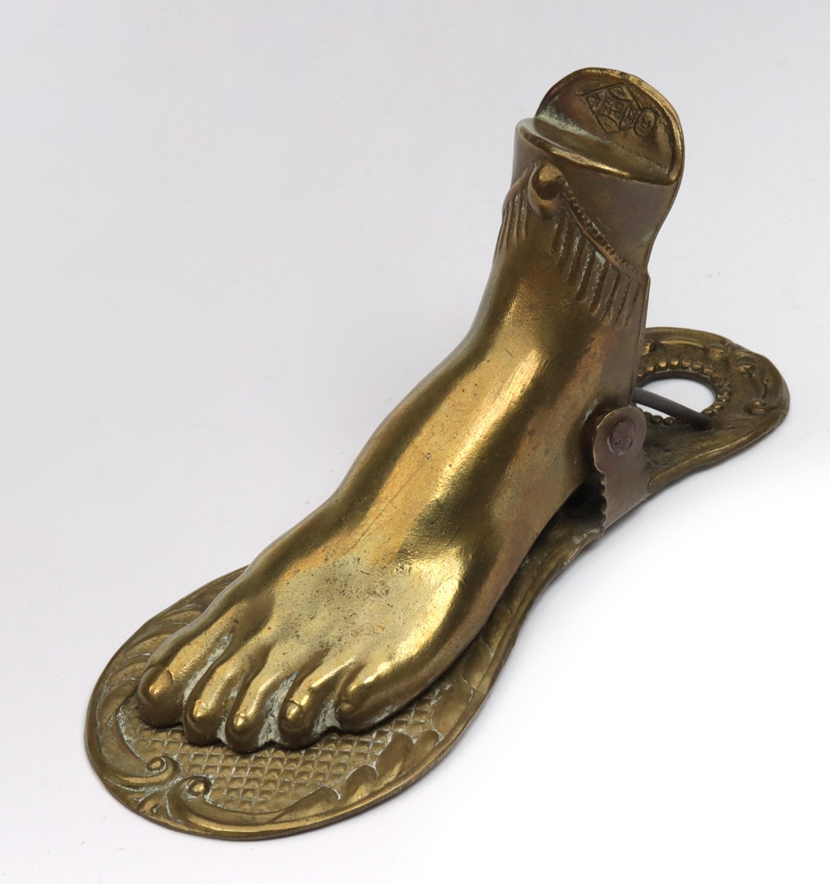 AN 1880s LADY'S FOOT FIGURAL BRASS LETTER CLIP