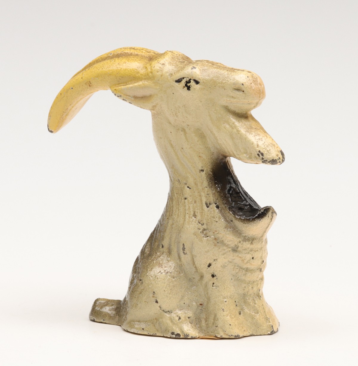 A VINTAGE FIGURAL BILLY GOAT IRON BOTTLE OPENER