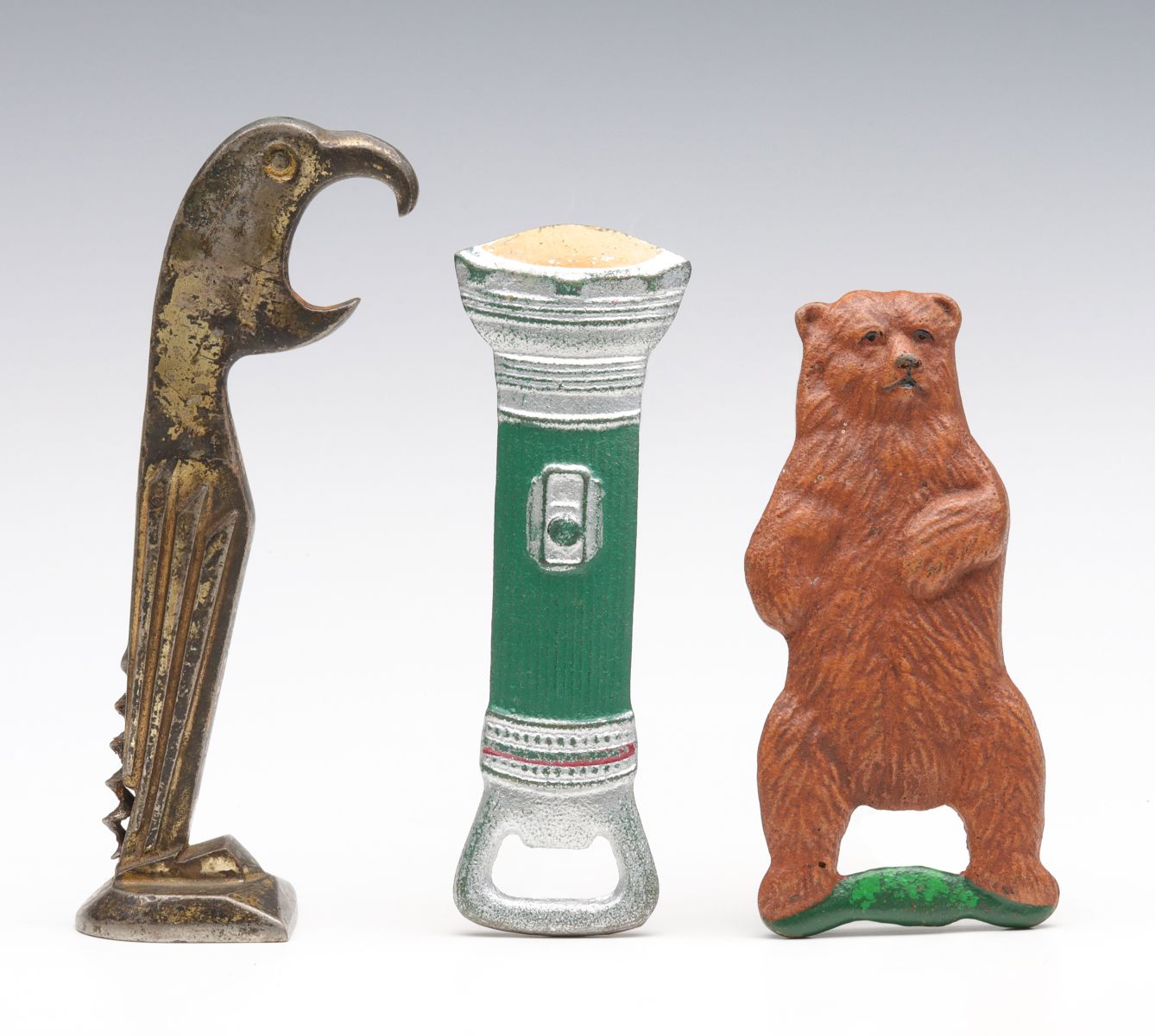 THREE VINTAGE FIGURAL BOTTLE OPENERS