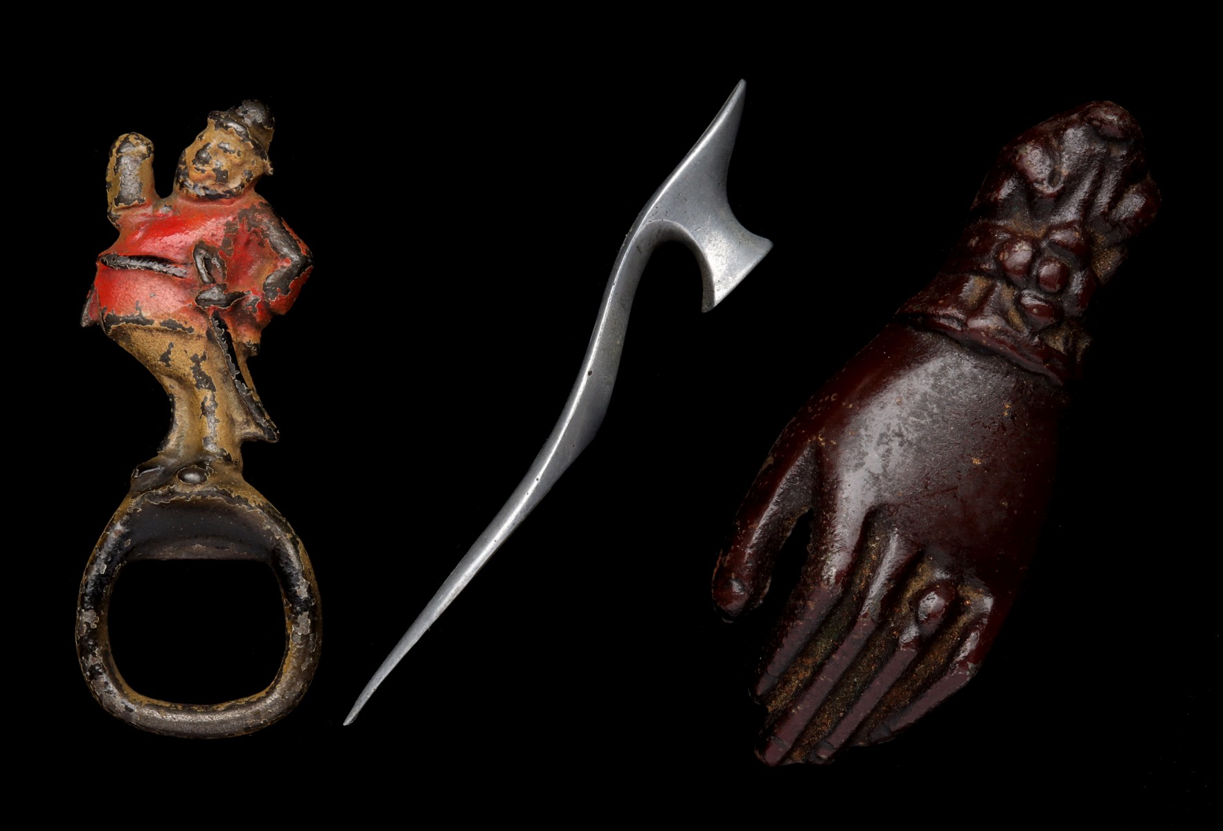 THREE VINTAGE FIGURAL BOTTLE OPENERS