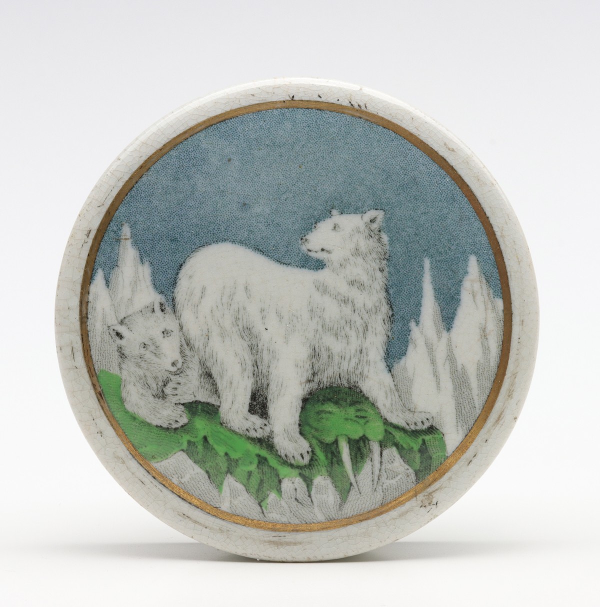 A 19TH C BEAR GREASE STAFFORDSHIRE POT LID